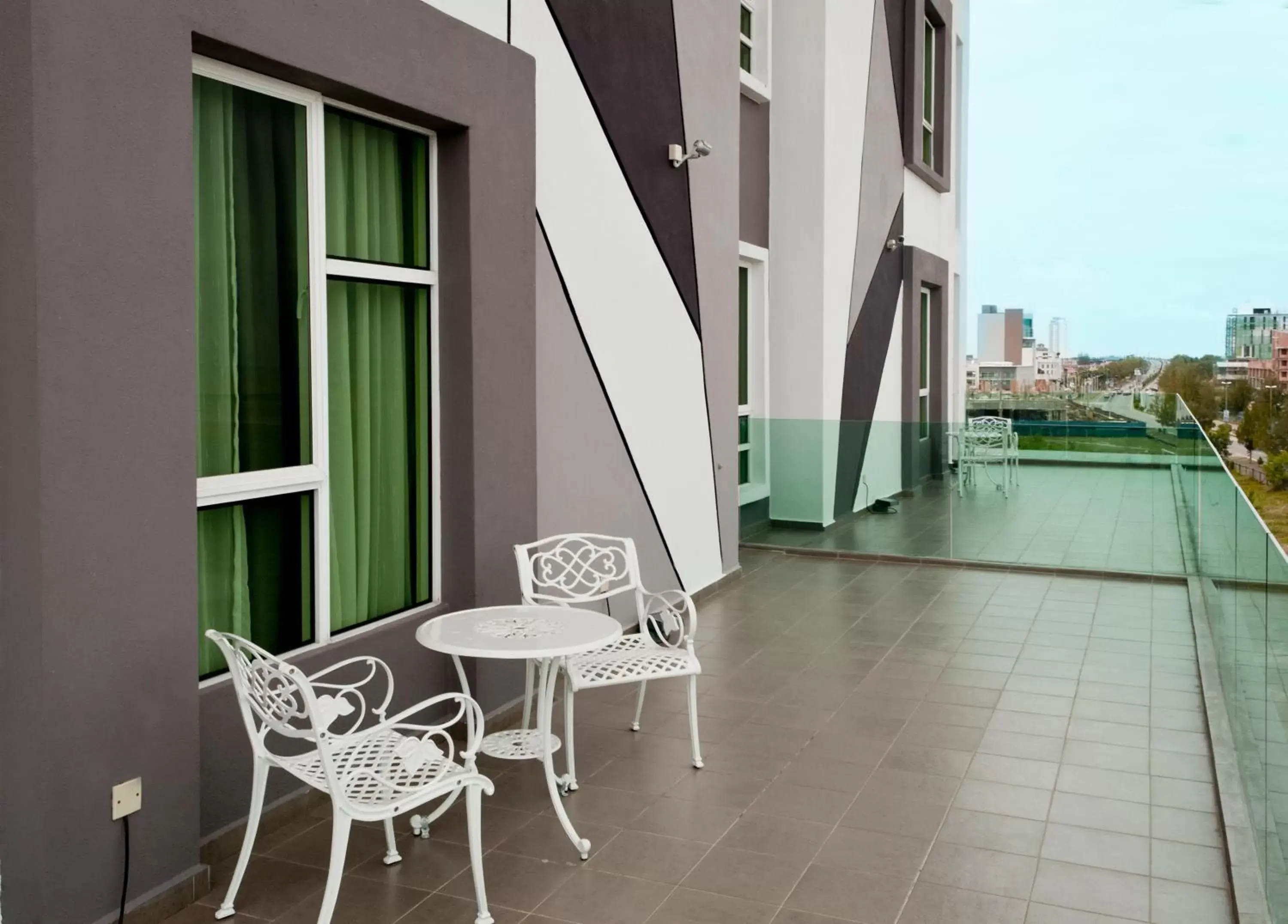 Patio, Balcony/Terrace in Marvelux Hotel