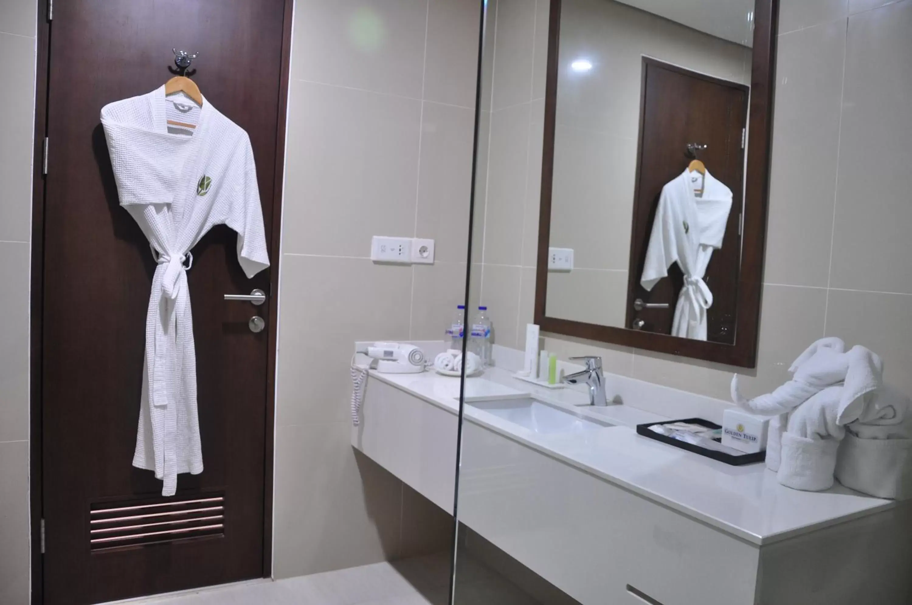 Bed, Bathroom in Golden Tulip Pontianak