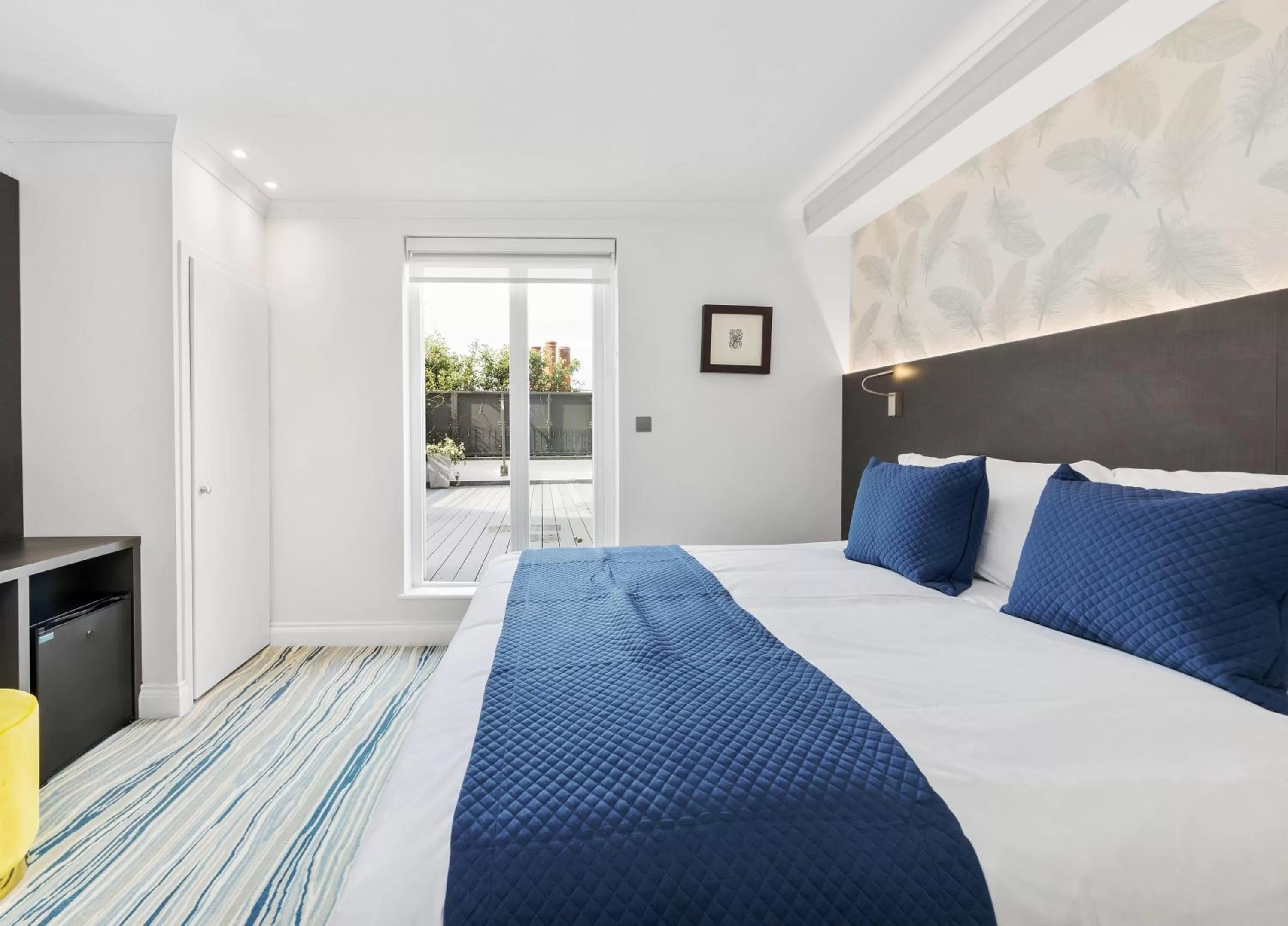 Bed in Commodore Hotel