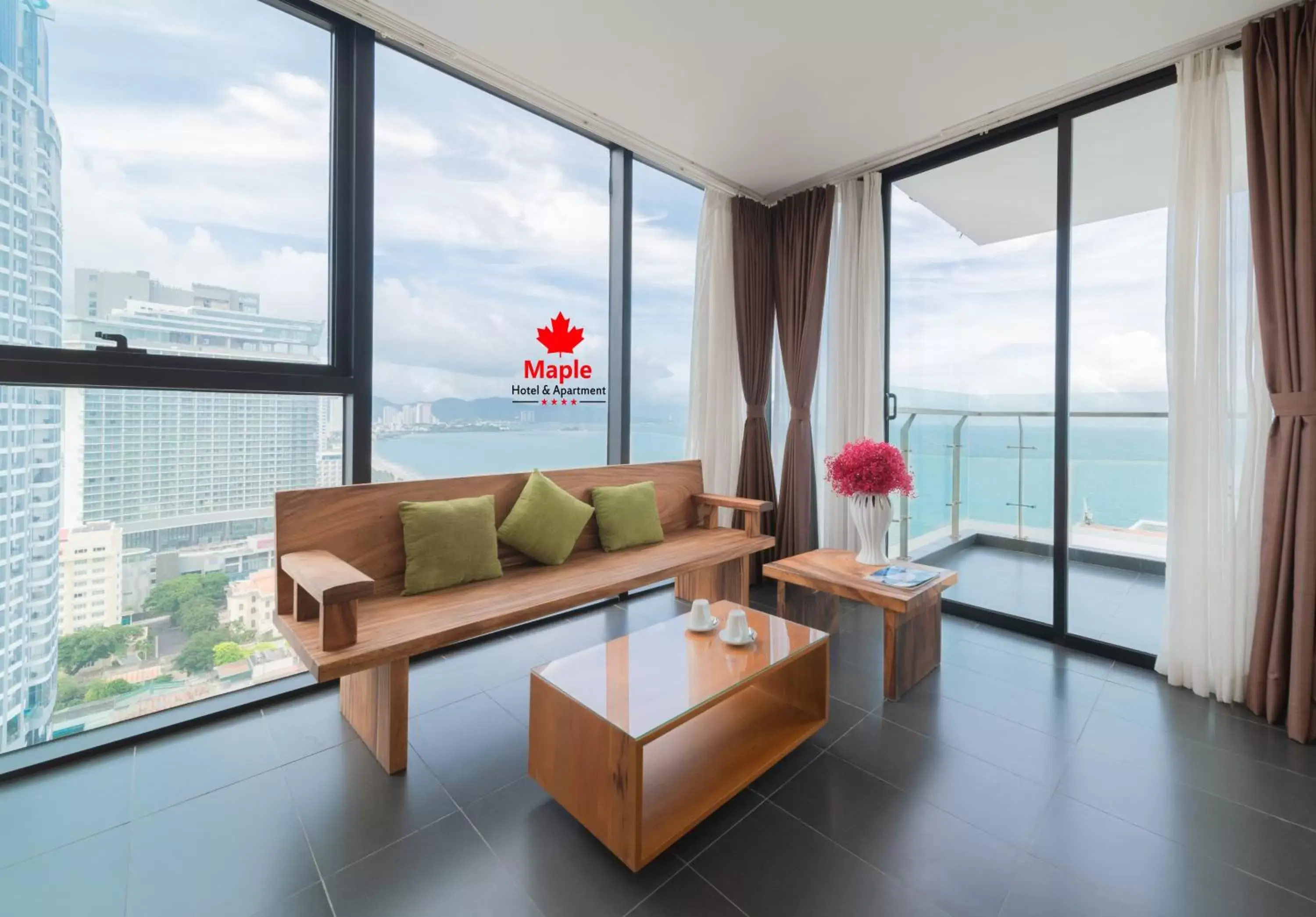 Living room in Maple Hotel & Apartment Living room in Maple Hotel & Apartment