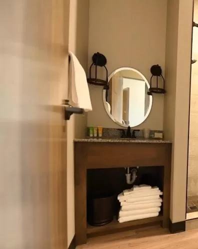 Bathroom, TV/Entertainment Center in Crosby Lofts