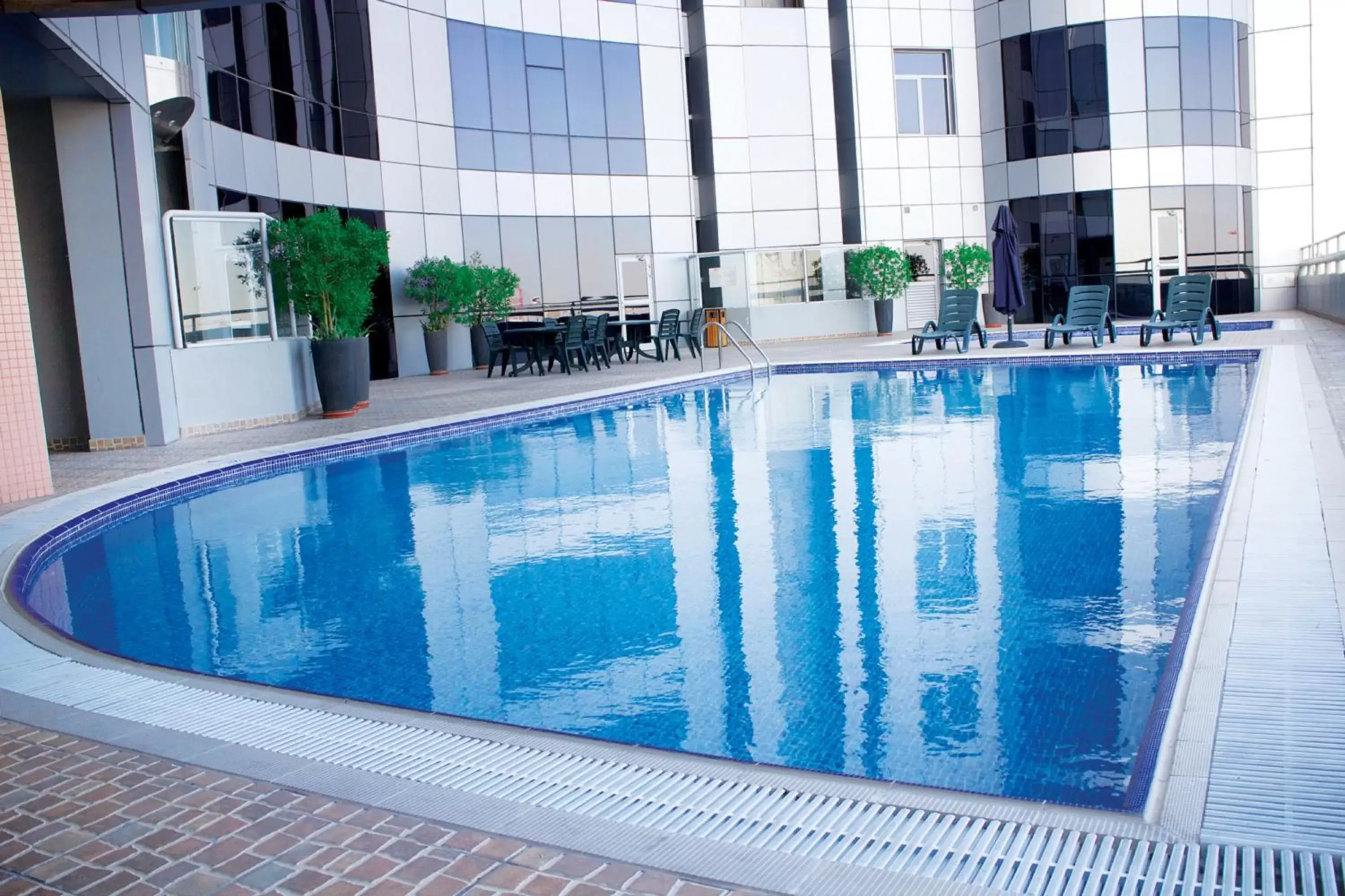 Swimming pool, Property Building in Royal Phoenicia Hotel