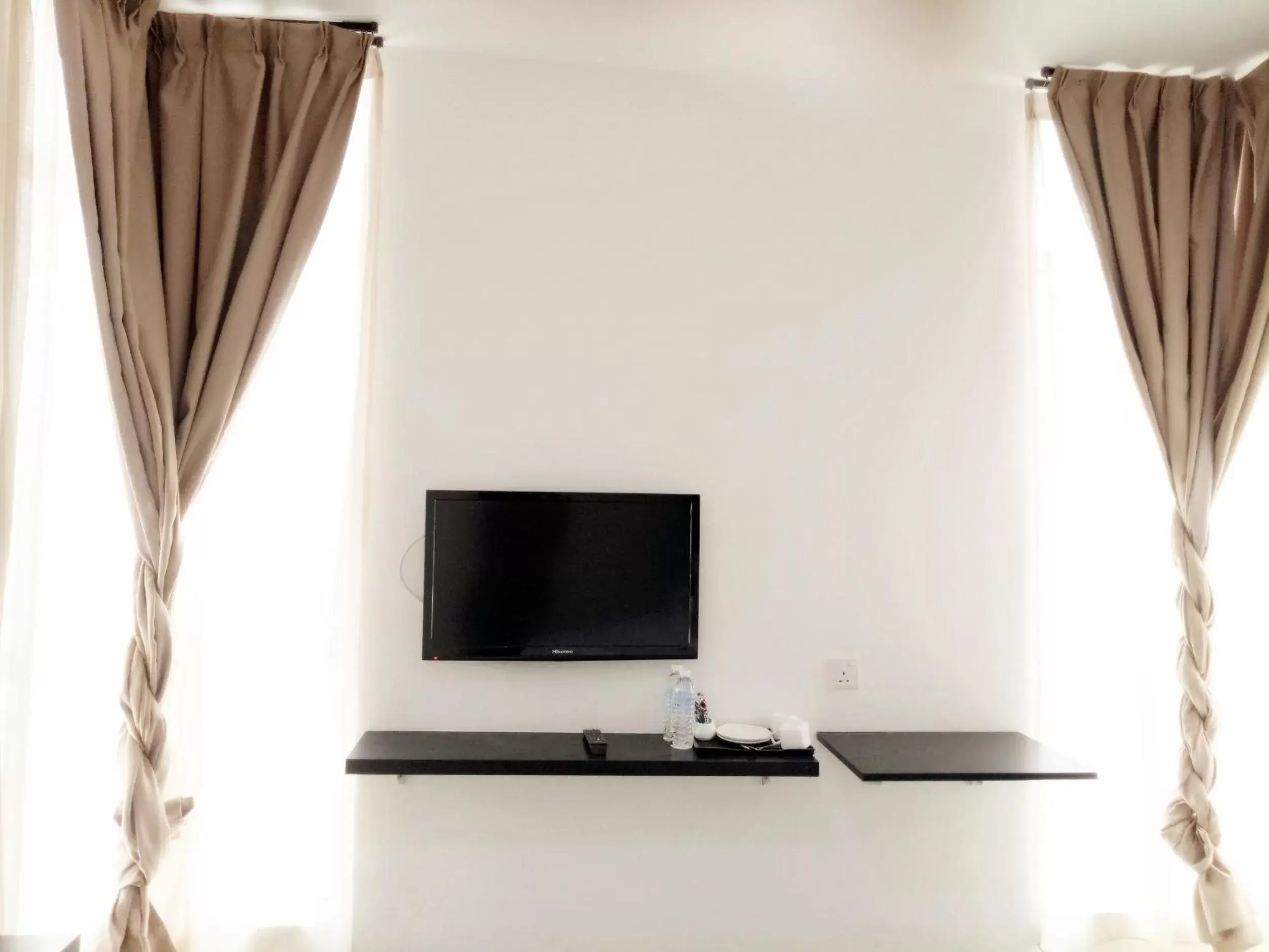 TV/Entertainment Center in Sandy Hotel Malacca