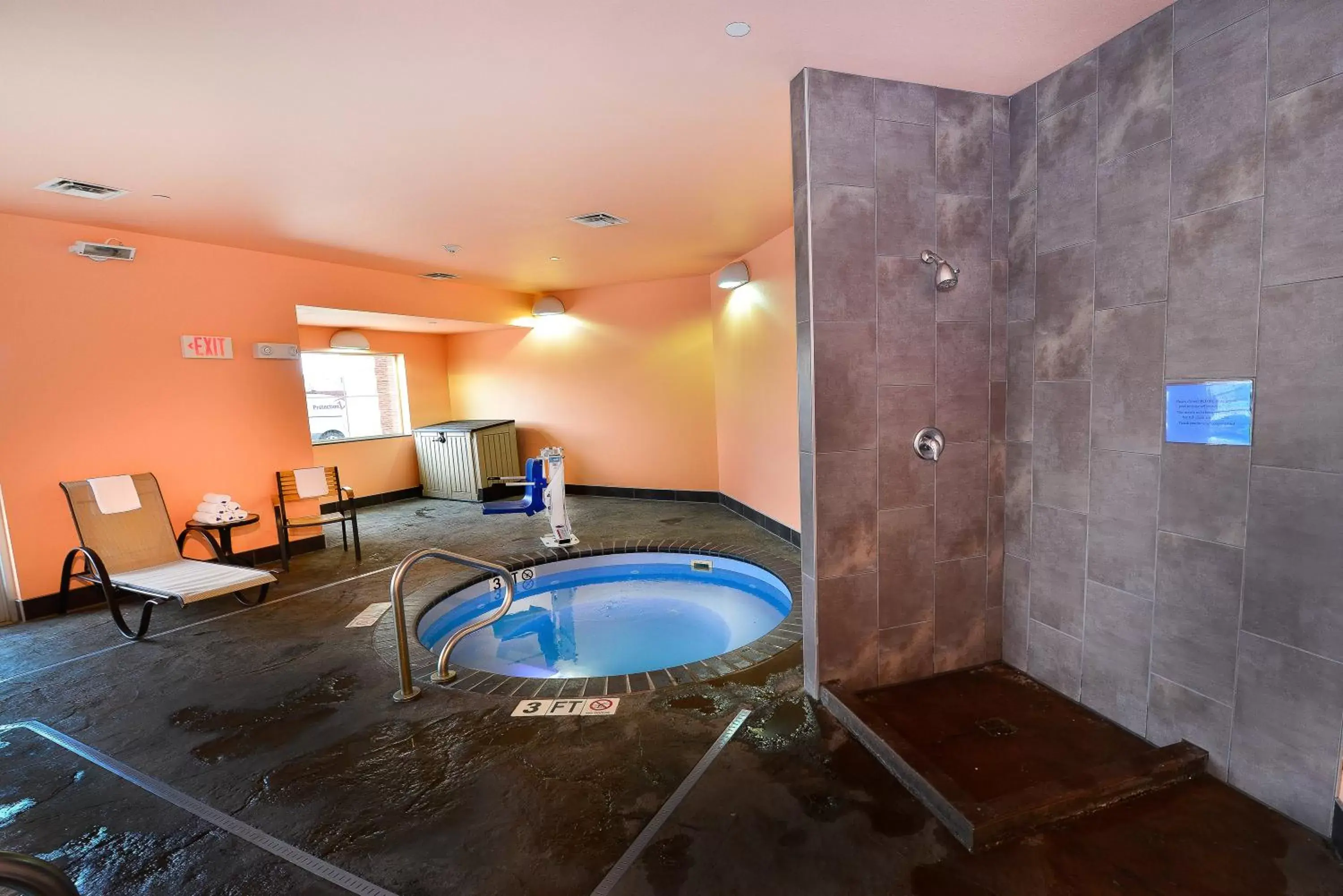 Swimming pool, Bathroom in Baymont by Wyndham Grand Forks