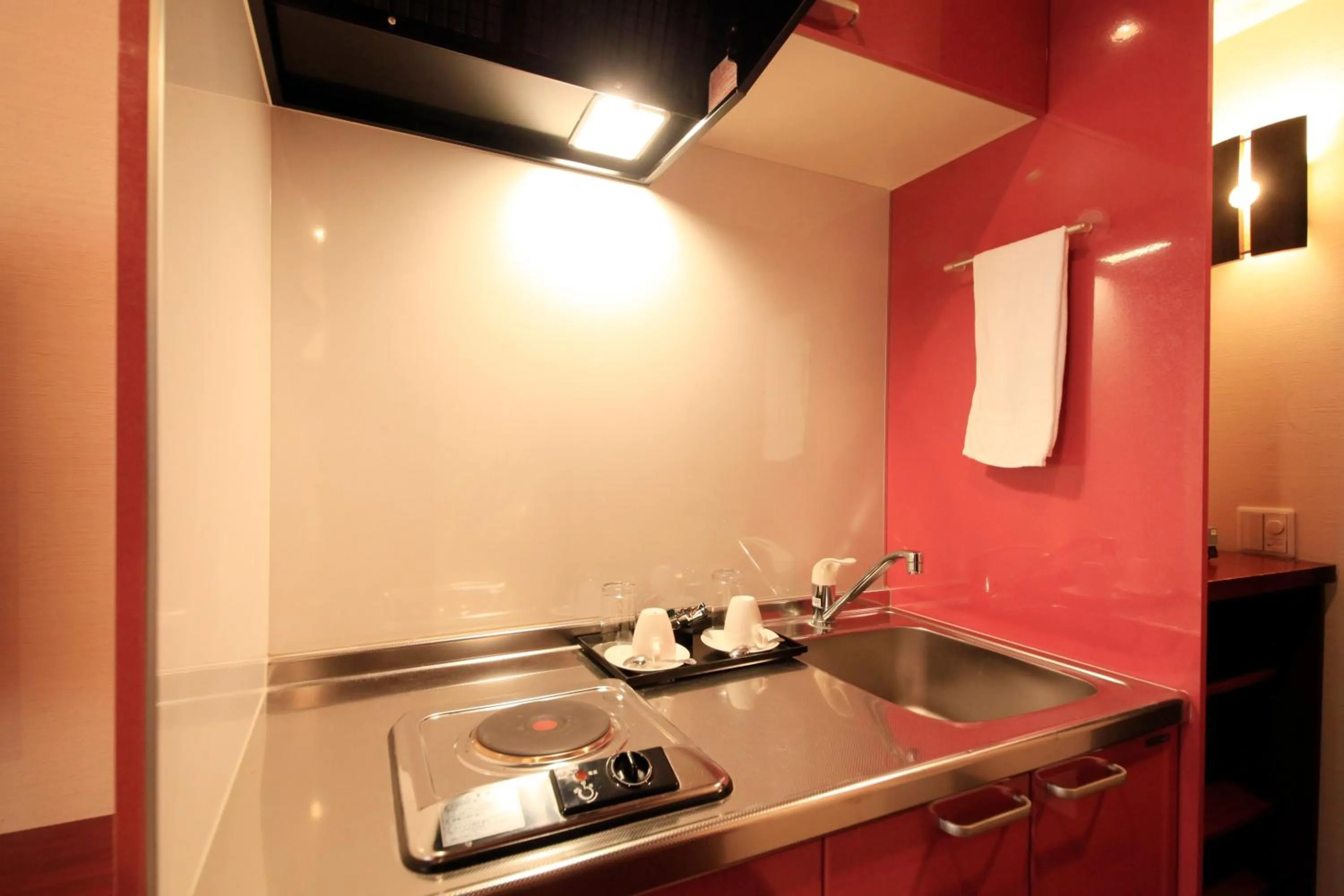 Kitchen or kitchenette in Centurion Hotel Residential Akasaka Station