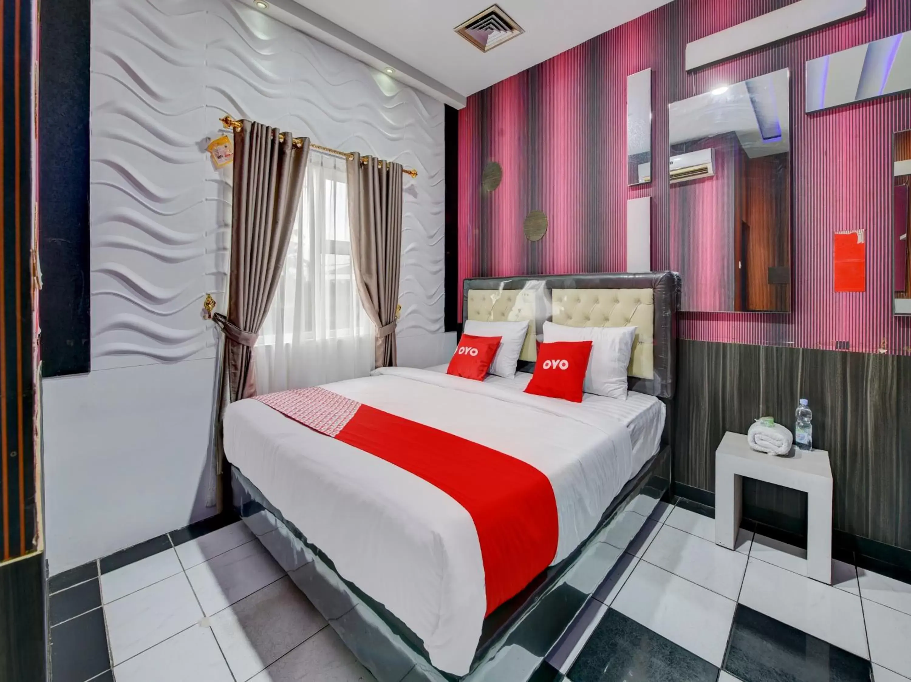 Bedroom in SUPER OYO 4010 Zaara Guest House Syariah