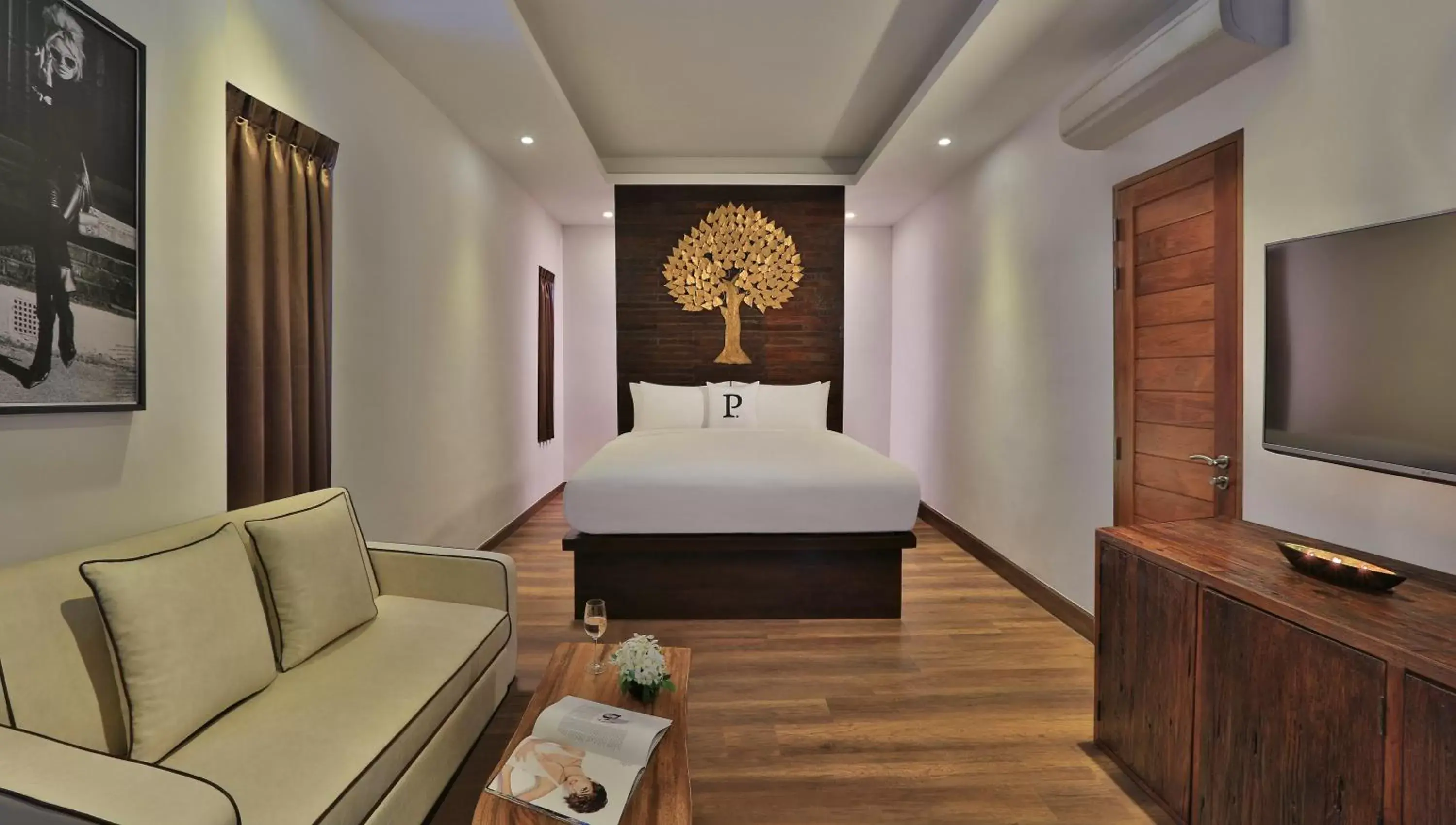 Bed in The Privilege Hotel Ezra Beach Club Bed in The Privilege Hotel Ezra Beach Club