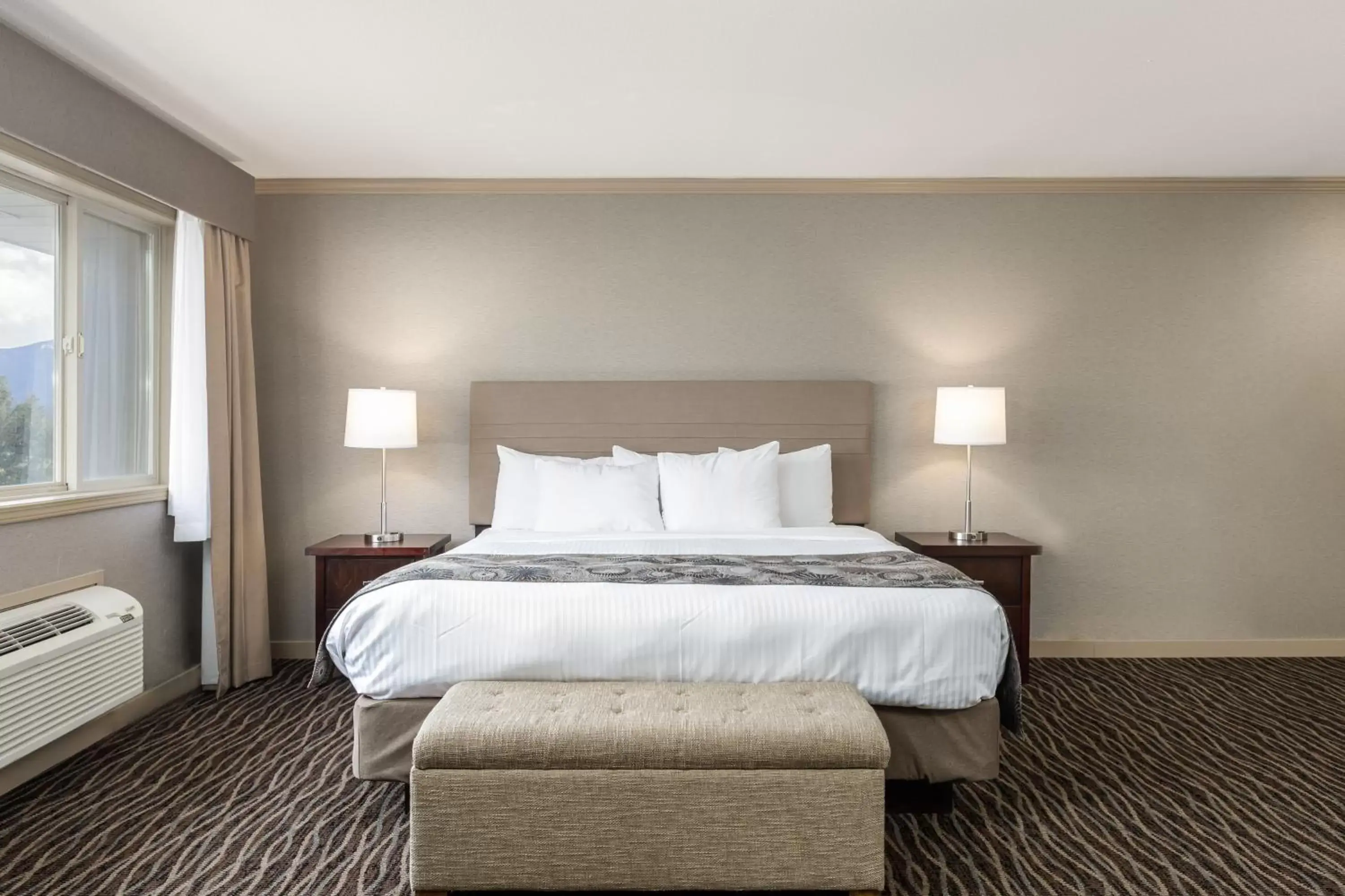Bed in Prestige Radium Hot Springs Resort, WorldHotels Crafted