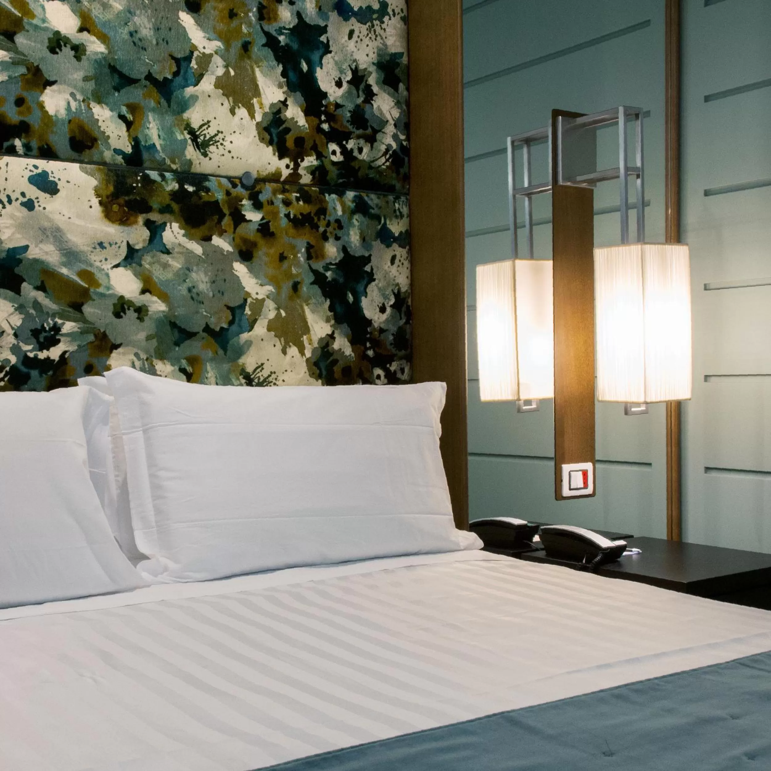 Bed in Stendhal Luxury Suites