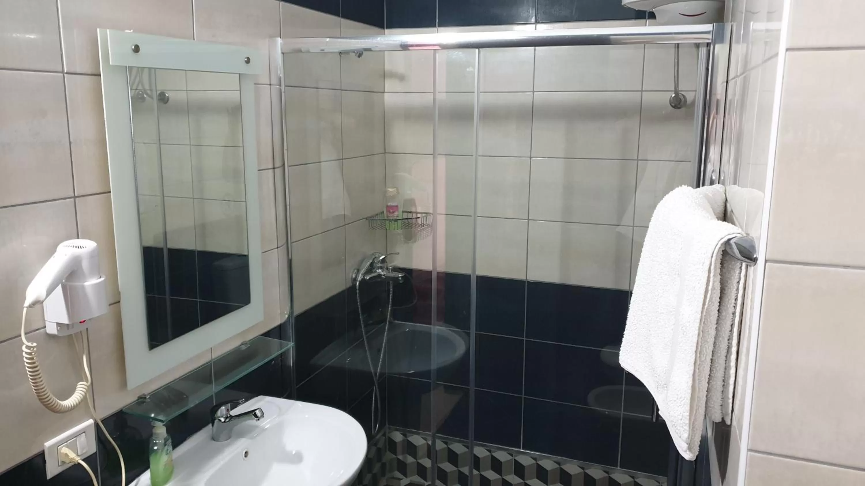 Shower in Haris Hotel