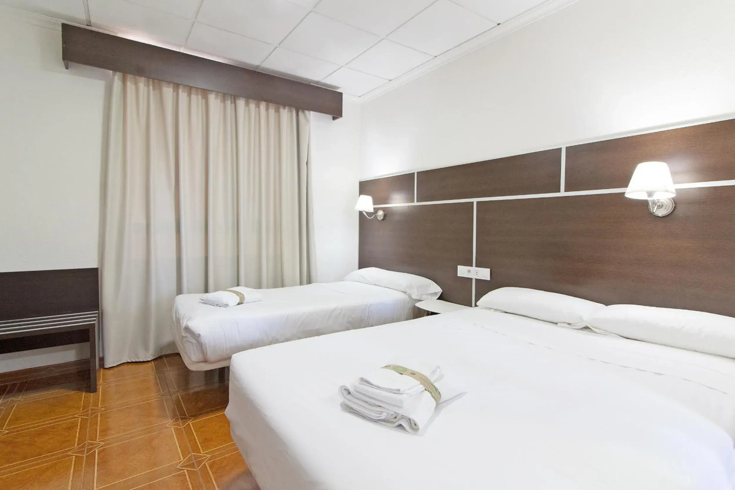 Bed in Hotel Sagunto
