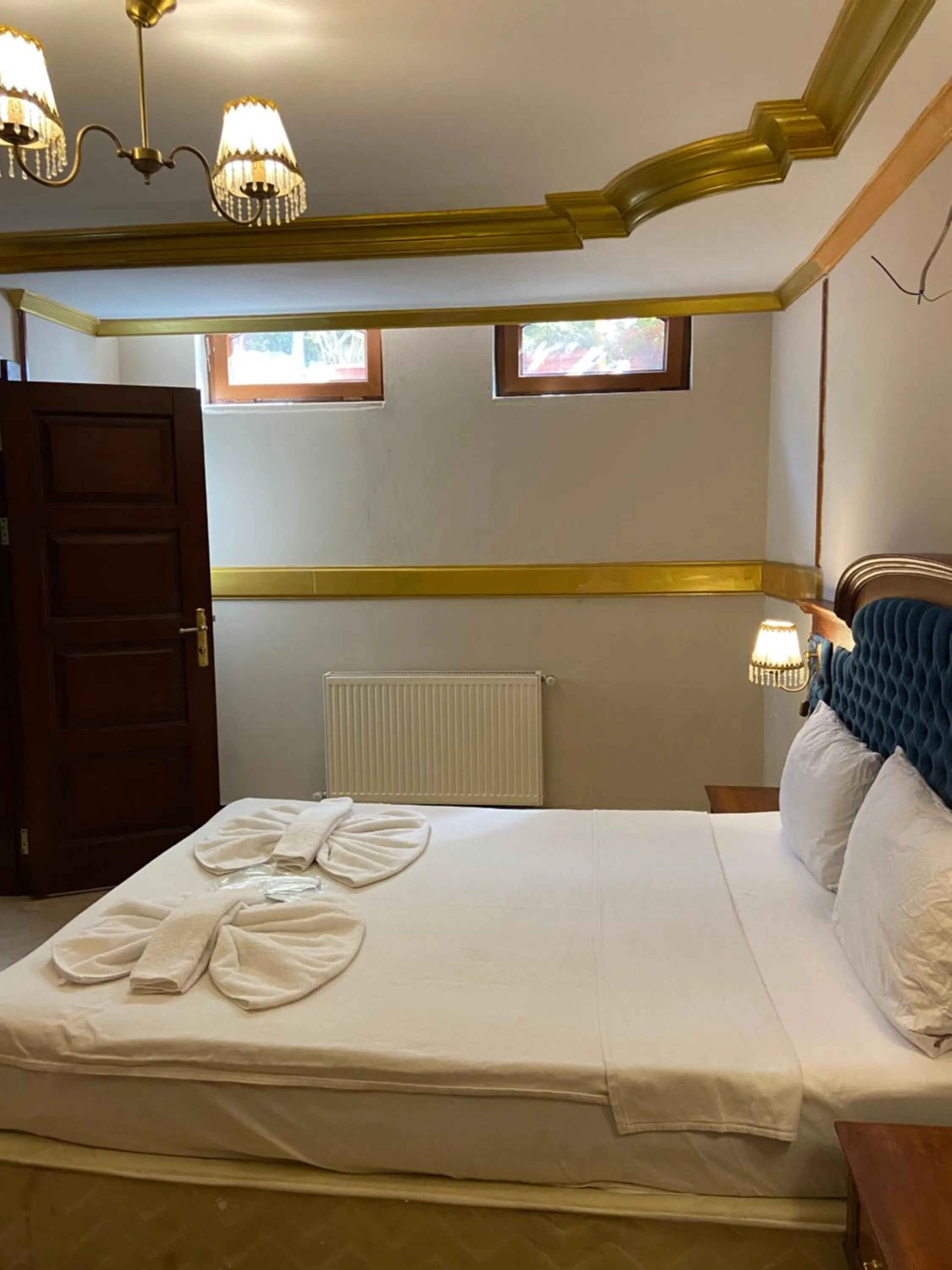 Bed in Aruna Boutique Hotel