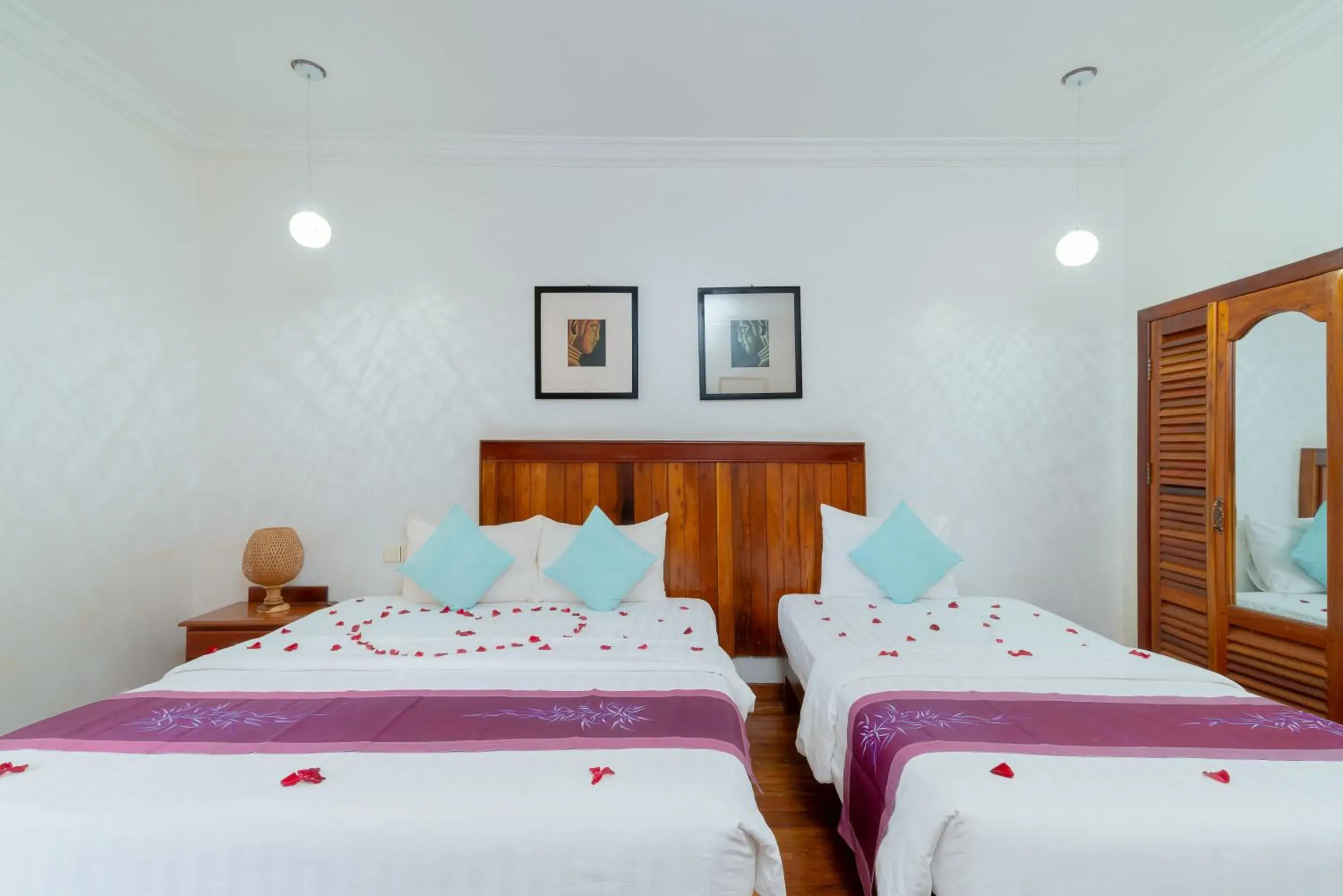 Bed in Asanak D'Angkor Boutique Hotel