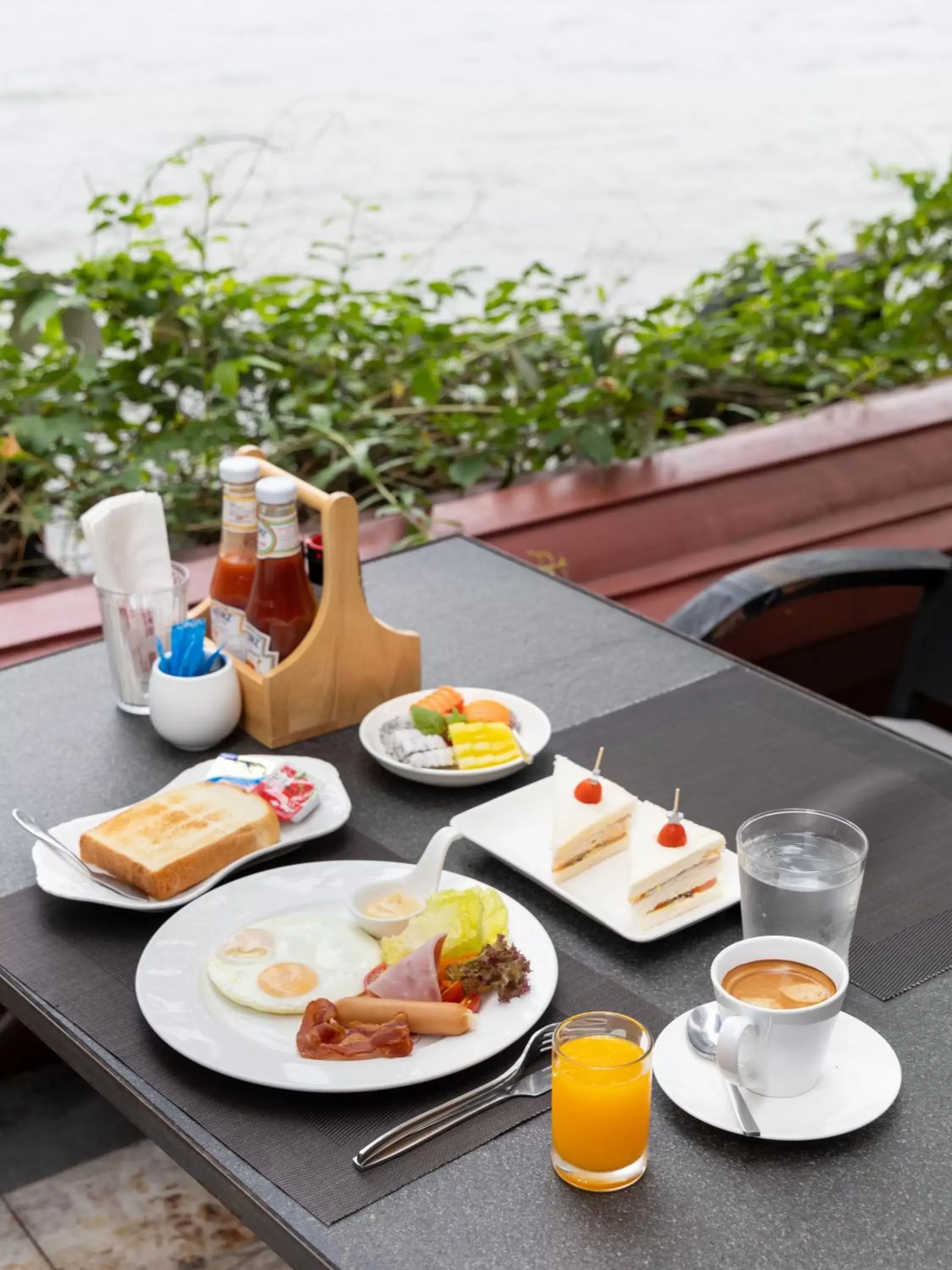 Breakfast in Amdaeng Bangkok Riverside Hotel - SHA Plus Certified