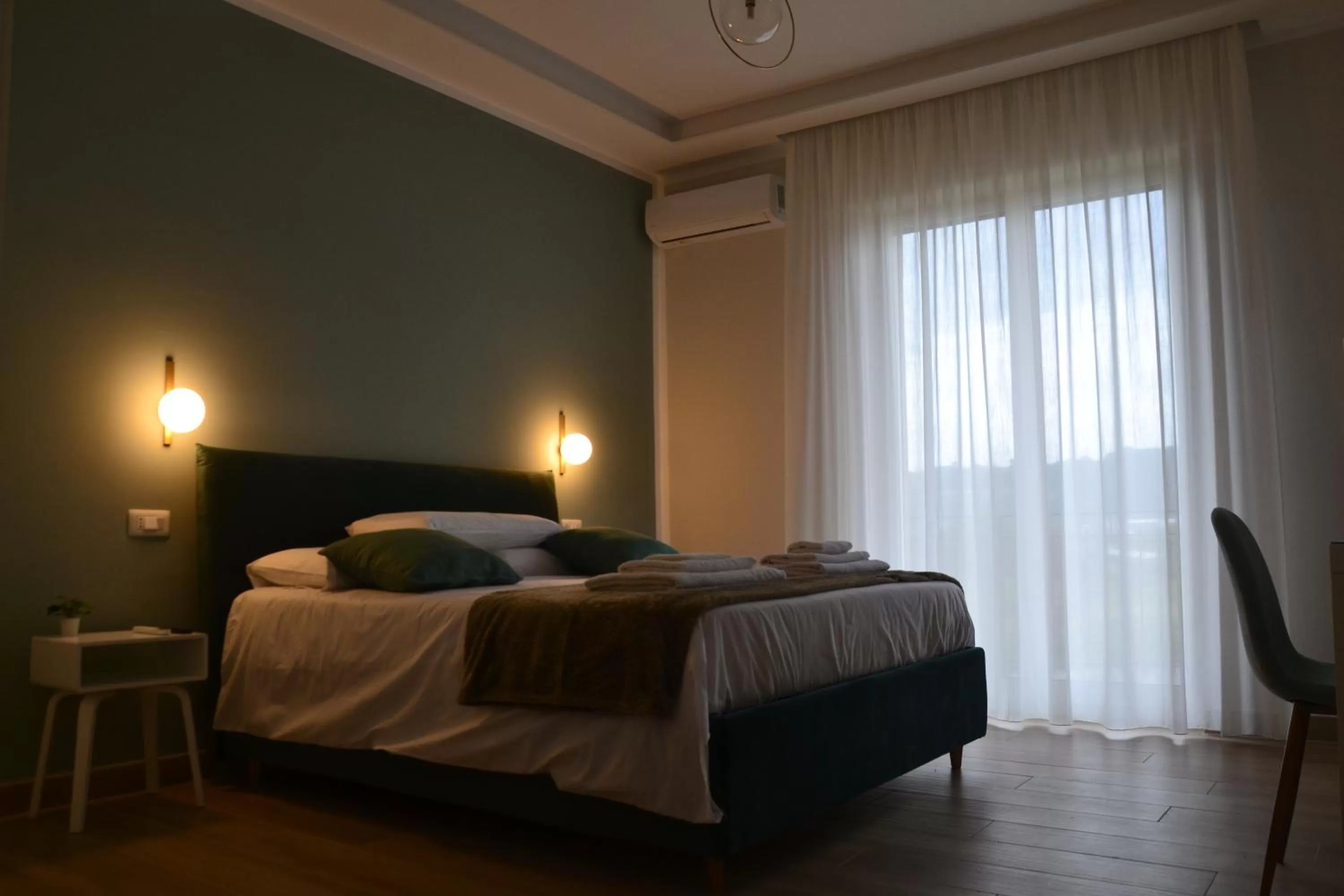 Bed in Luna Nuova Suites