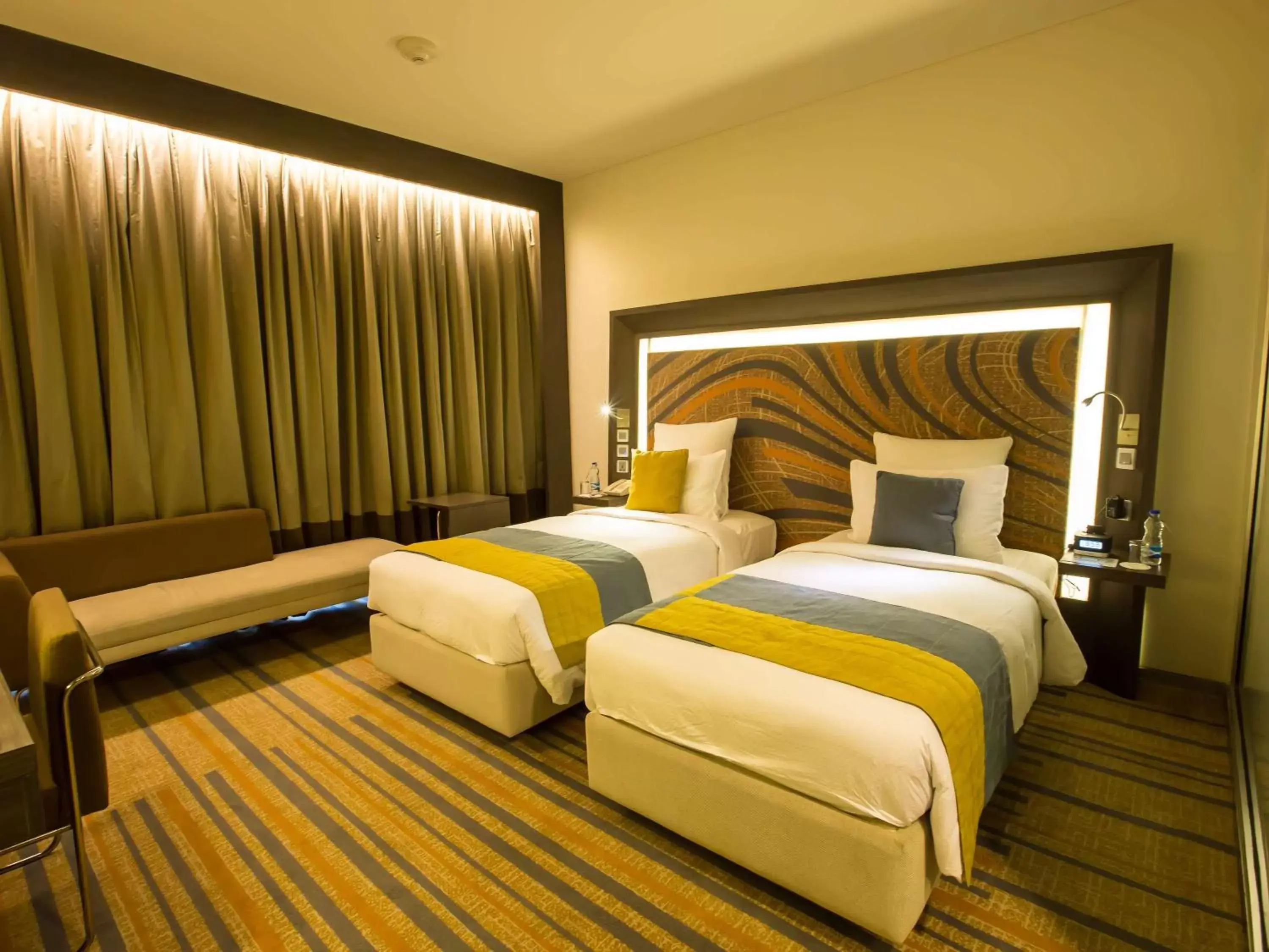 Photo of the whole room, Bed in Novotel Kolkata Hotel and Residences