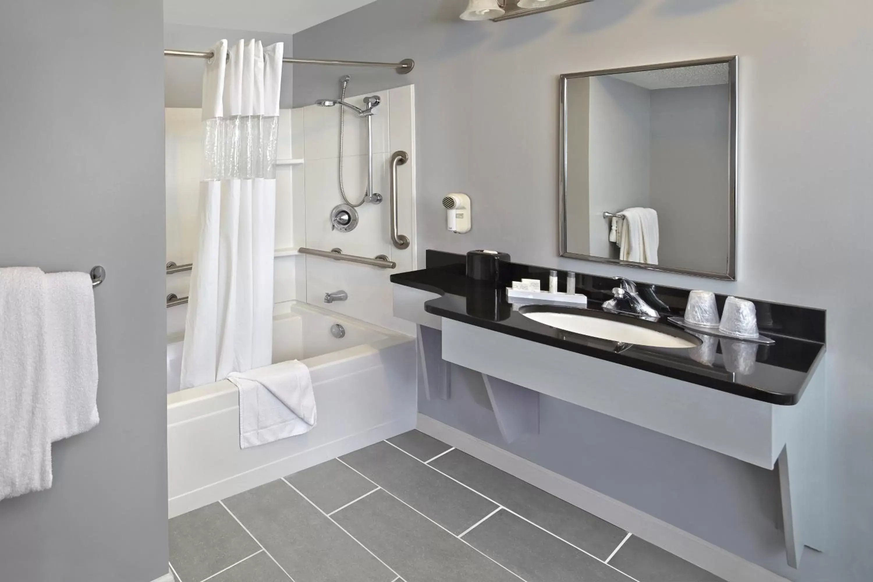 Bathroom in New Haven Village Suites