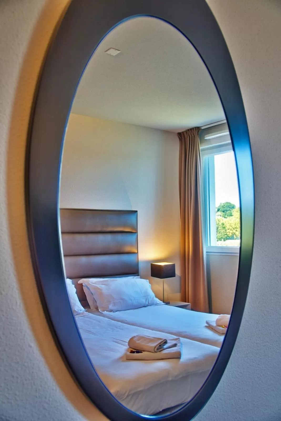 Bed in Adonis Hotel Bayonne