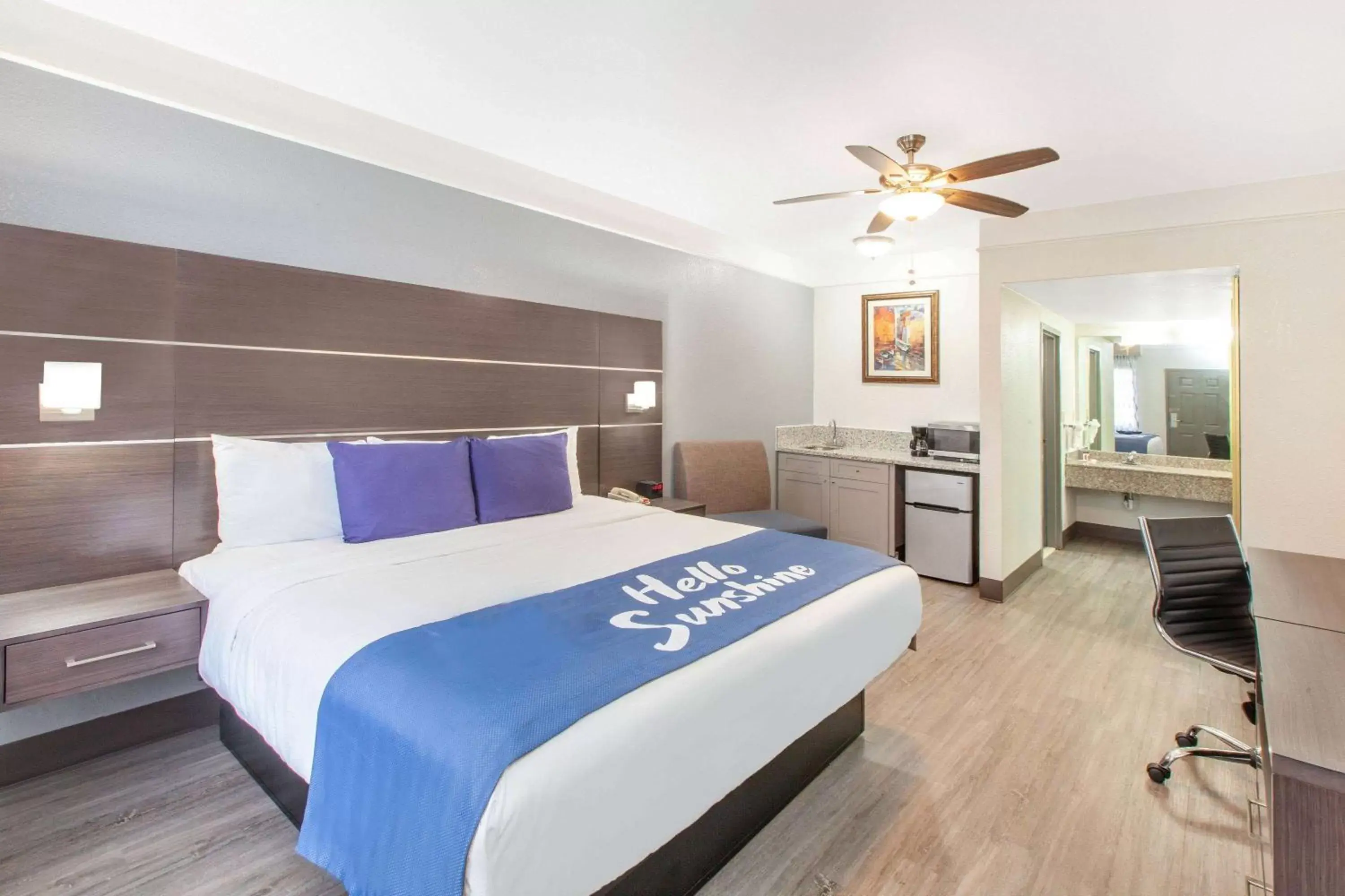 Photo of the whole room, Bed in Days Inn & Suites by Wyndham Webster NASA-ClearLake-Houston