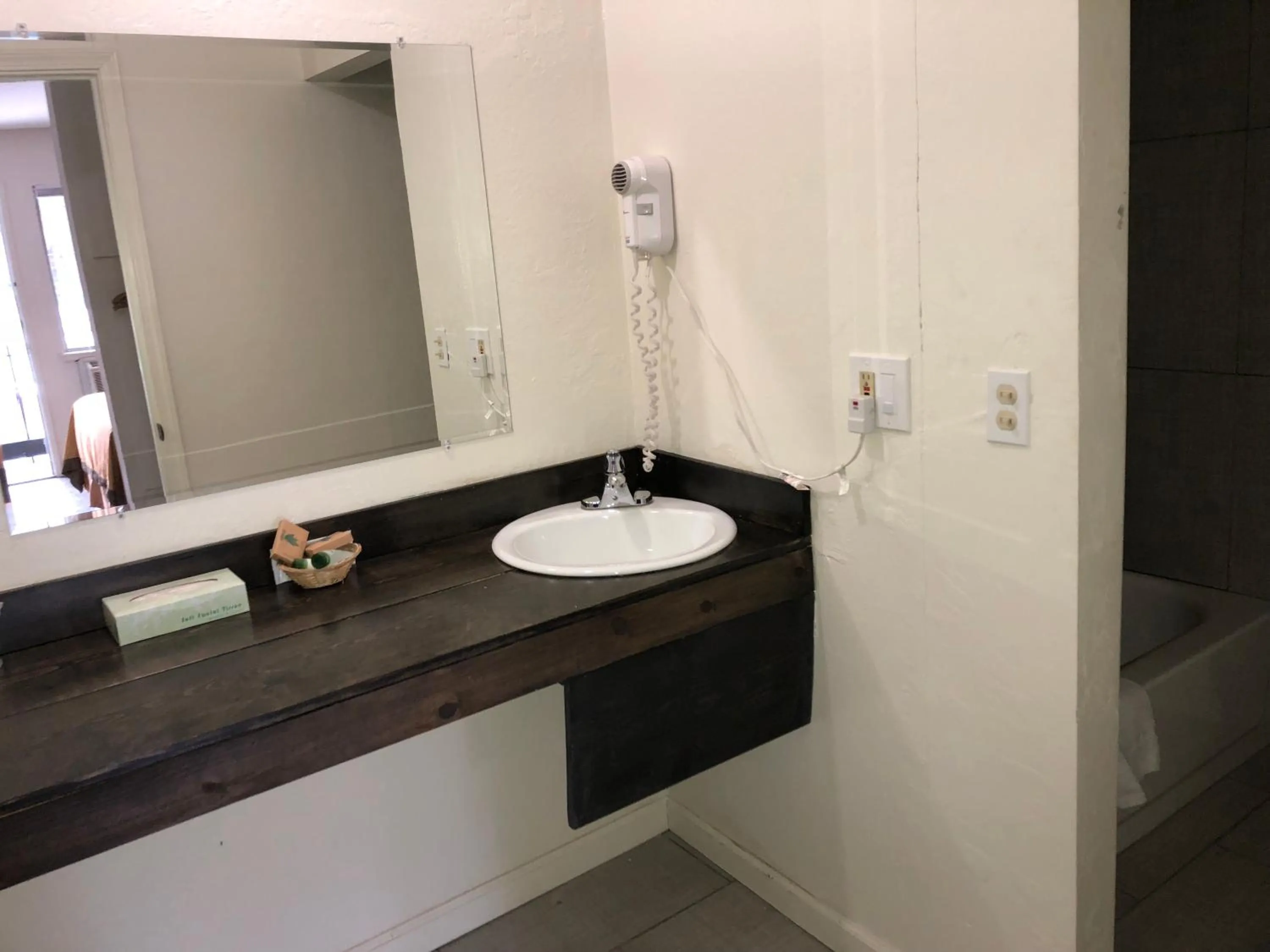 Bathroom in Cedar Inn & Suites