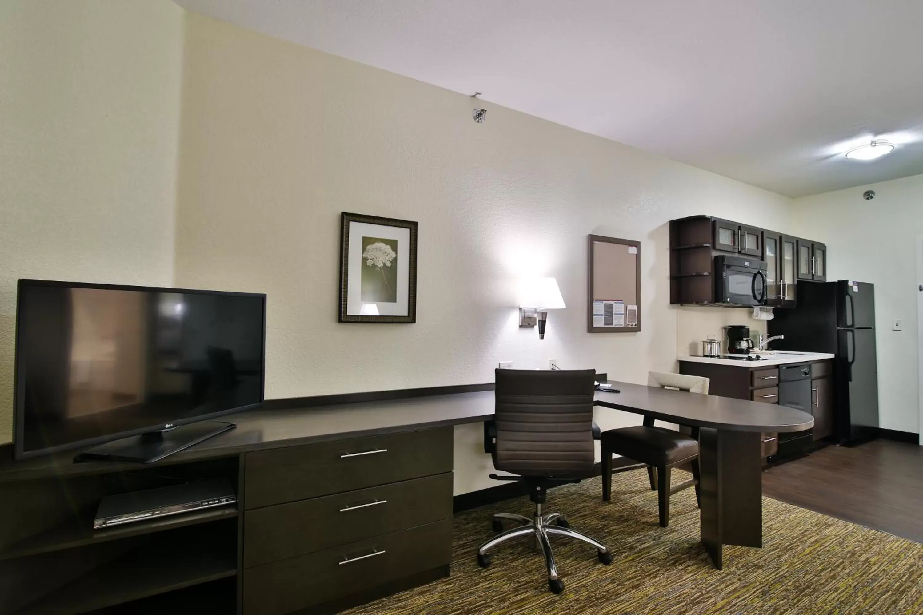 Photo of the whole room, TV/Entertainment Center in Candlewood Suites Bismarck