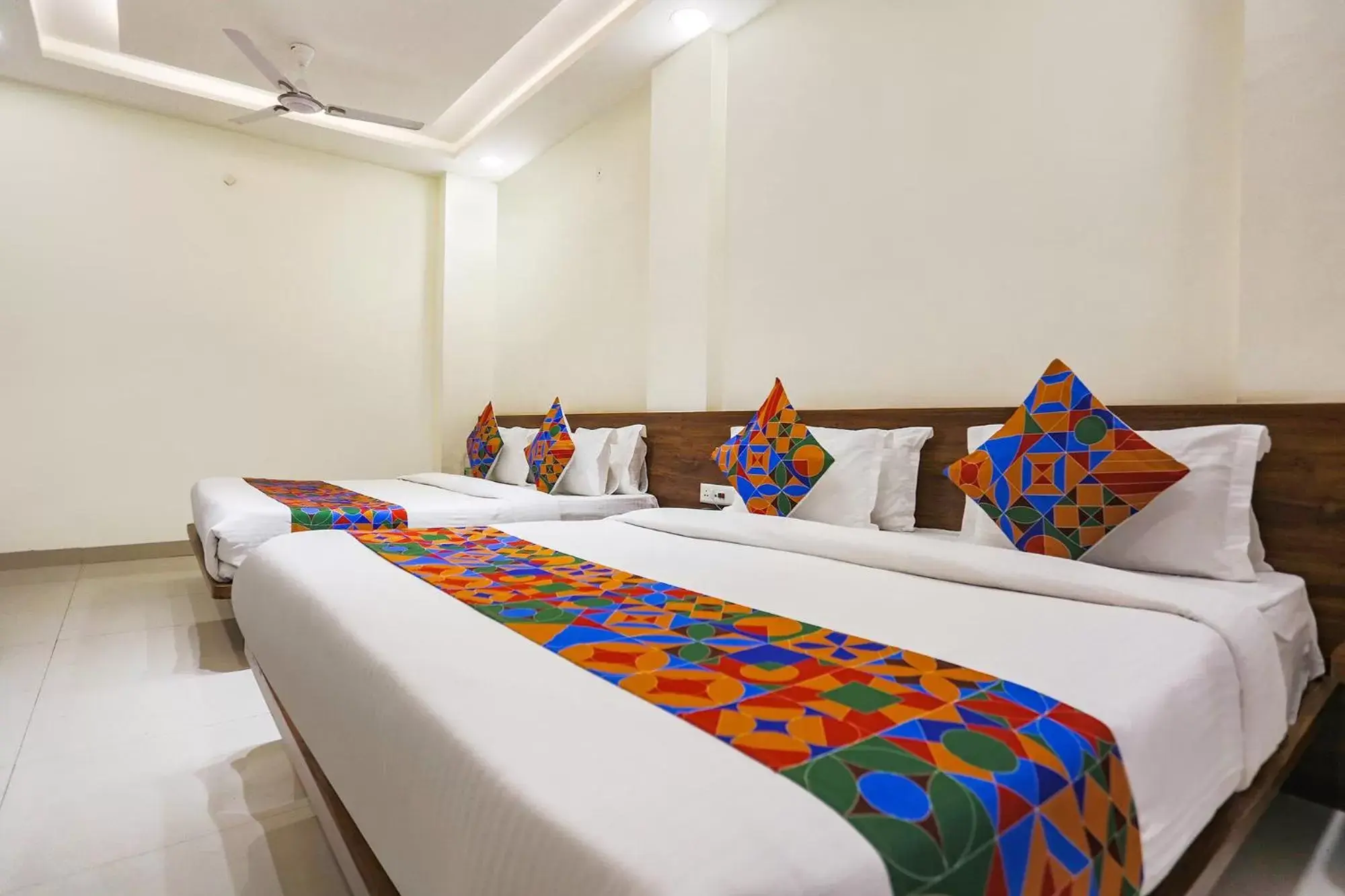 Bed in FabHotel Balaji Paradise Bed in FabHotel Balaji Paradise