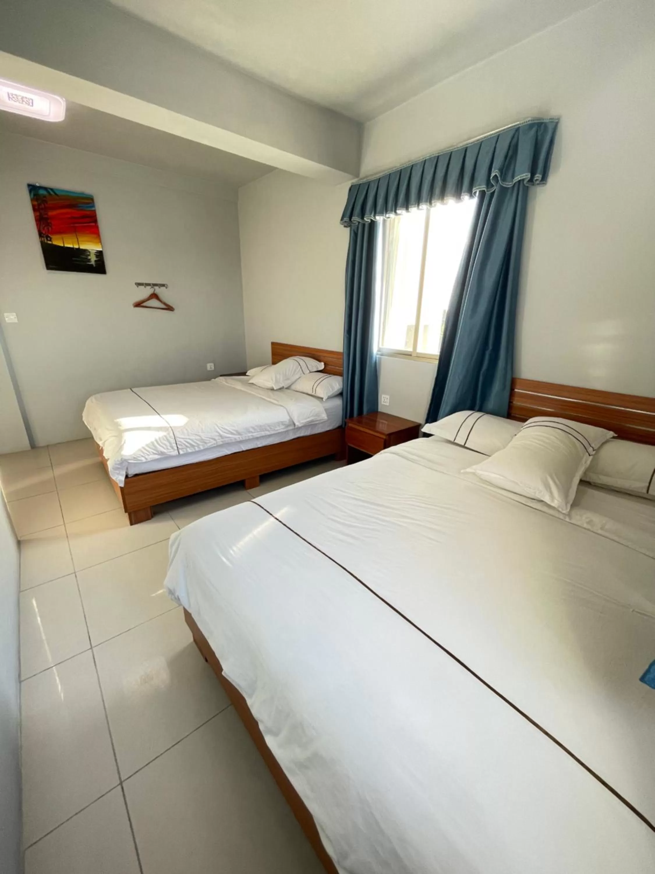 Bed in Caye Caulker Beach Hotel