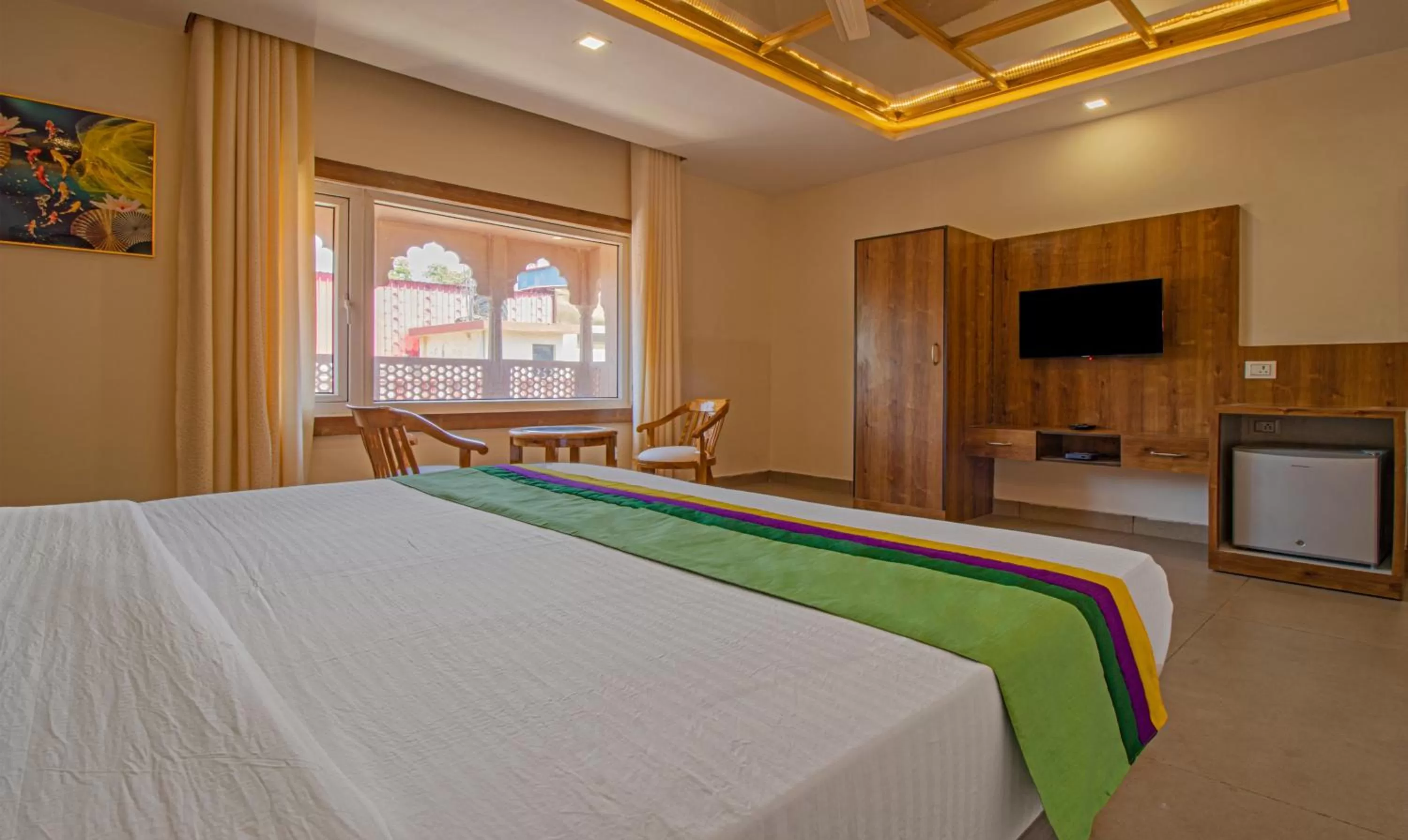 Bed in Treebo Trend Haveli Resort Roots Bhupatwala