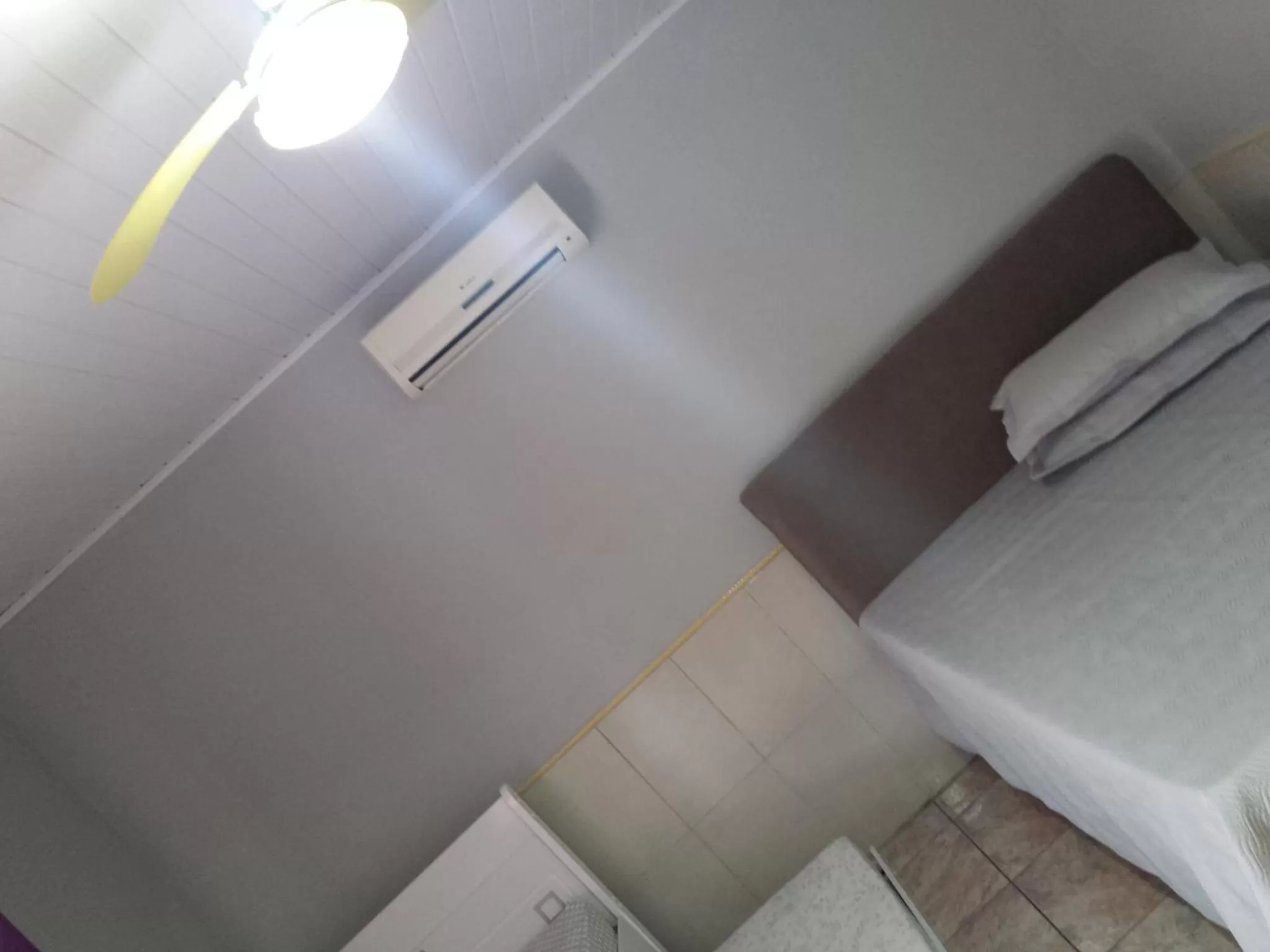 Bed in Pousada Tio Tonho