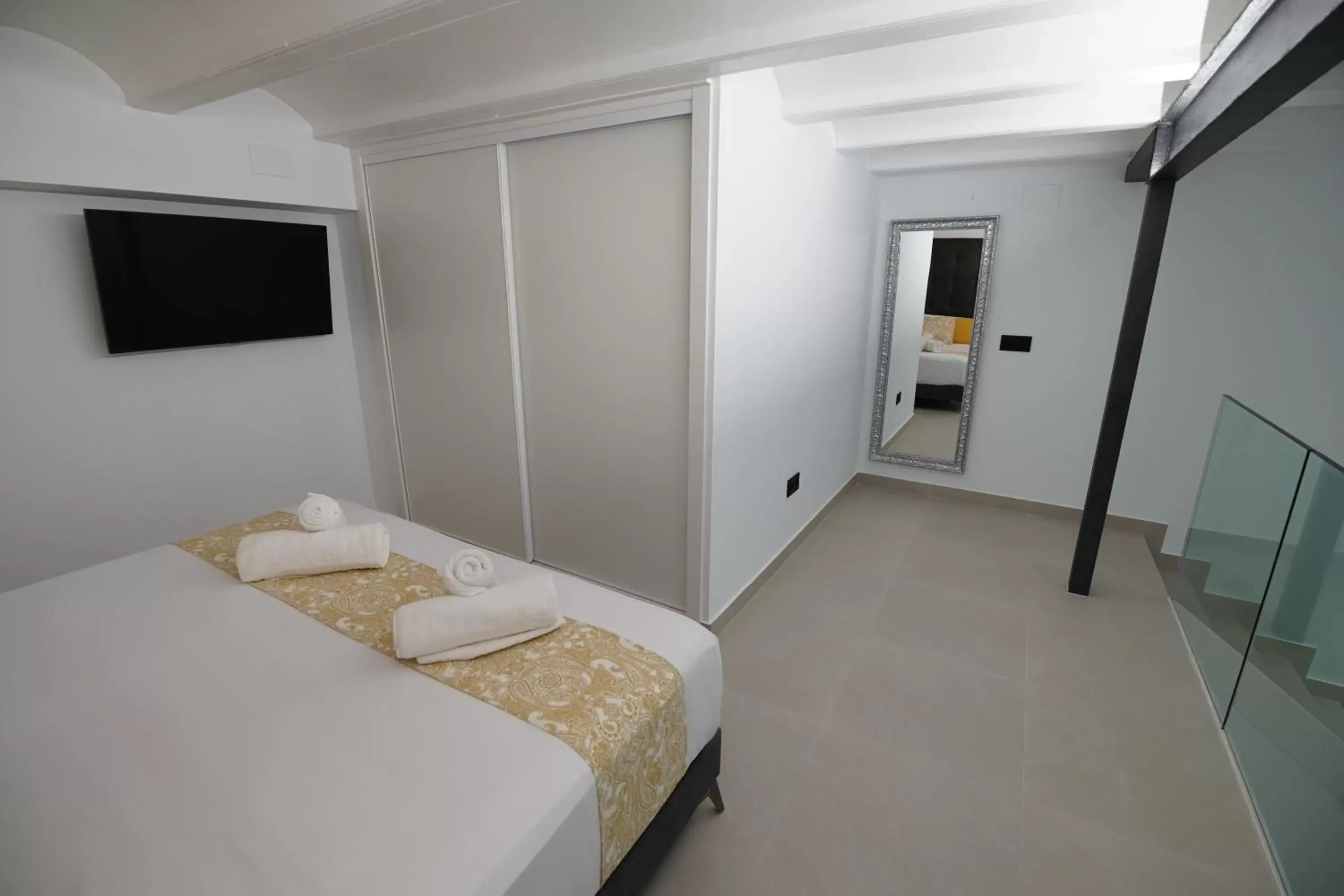 TV and multimedia, Bed in Suites Puerto Valencia