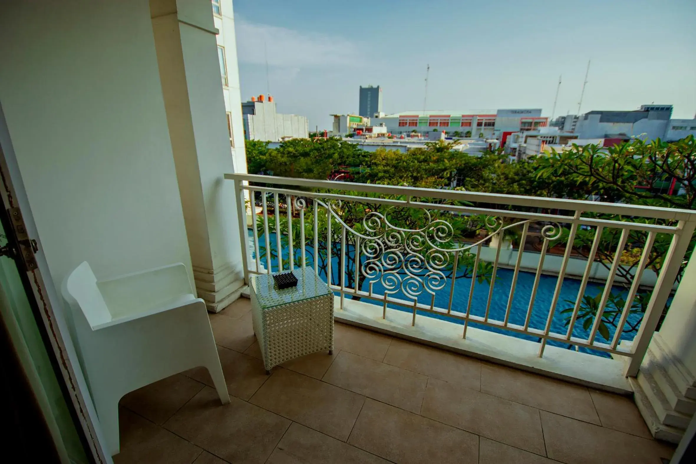 Balcony/Terrace, Pool View in Grand Zuri BSD City