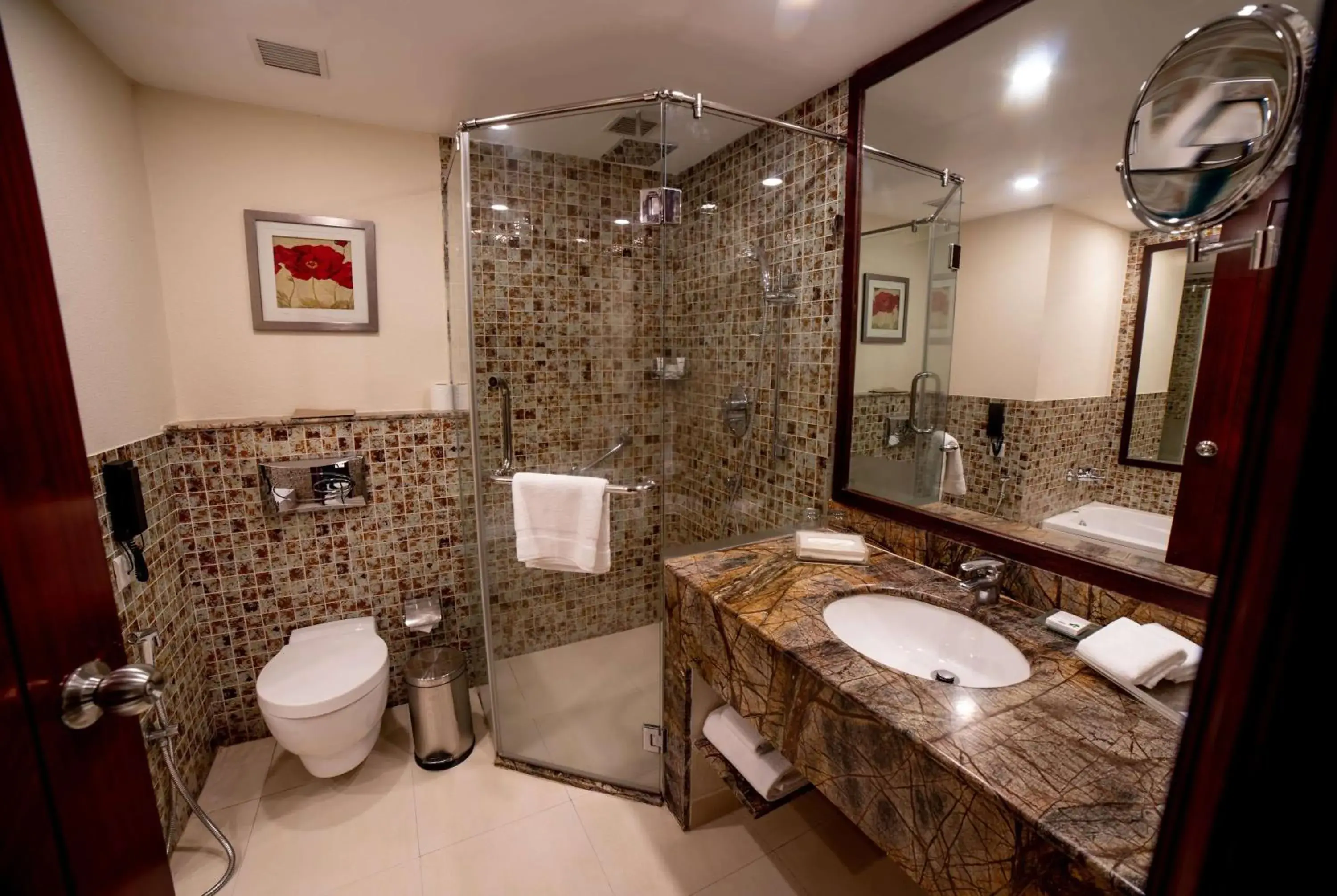 Bathroom in Ramada by Wyndham Jaipur Jaisinghpura Bathroom in Ramada by Wyndham Jaipur Jaisinghpura