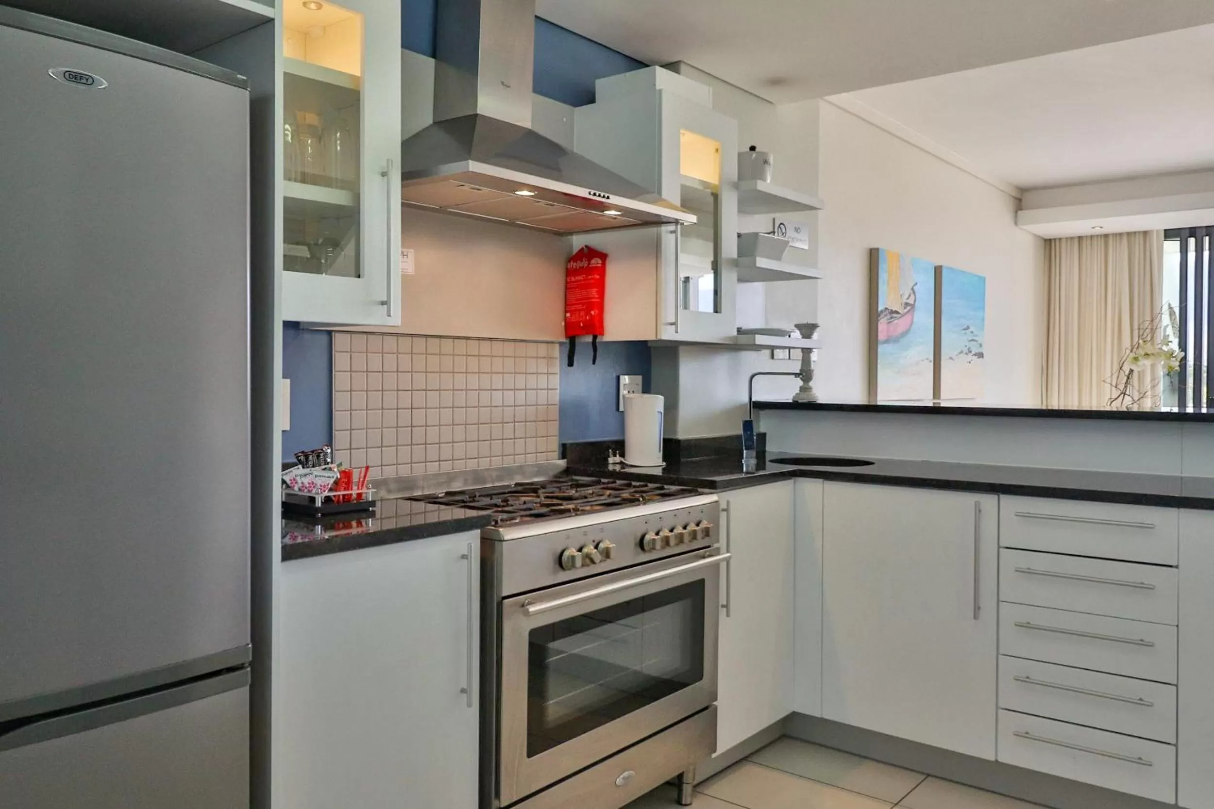 Kitchen or kitchenette in Whale Coast All-Suite-Hotel - DCC Hotel Group