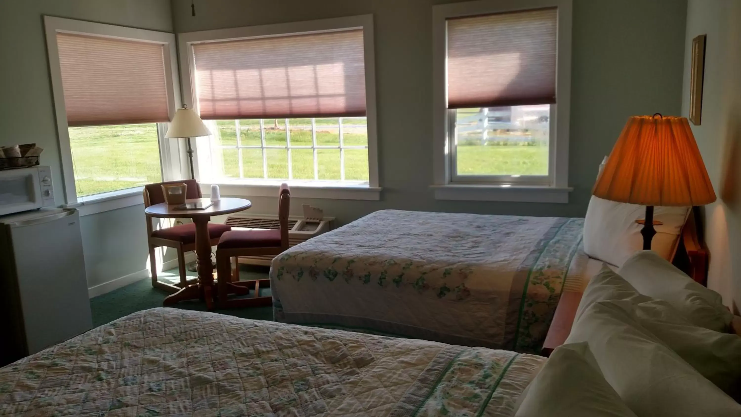 Decorative detail, Bed in Spruce Lane Lodge and Cottages