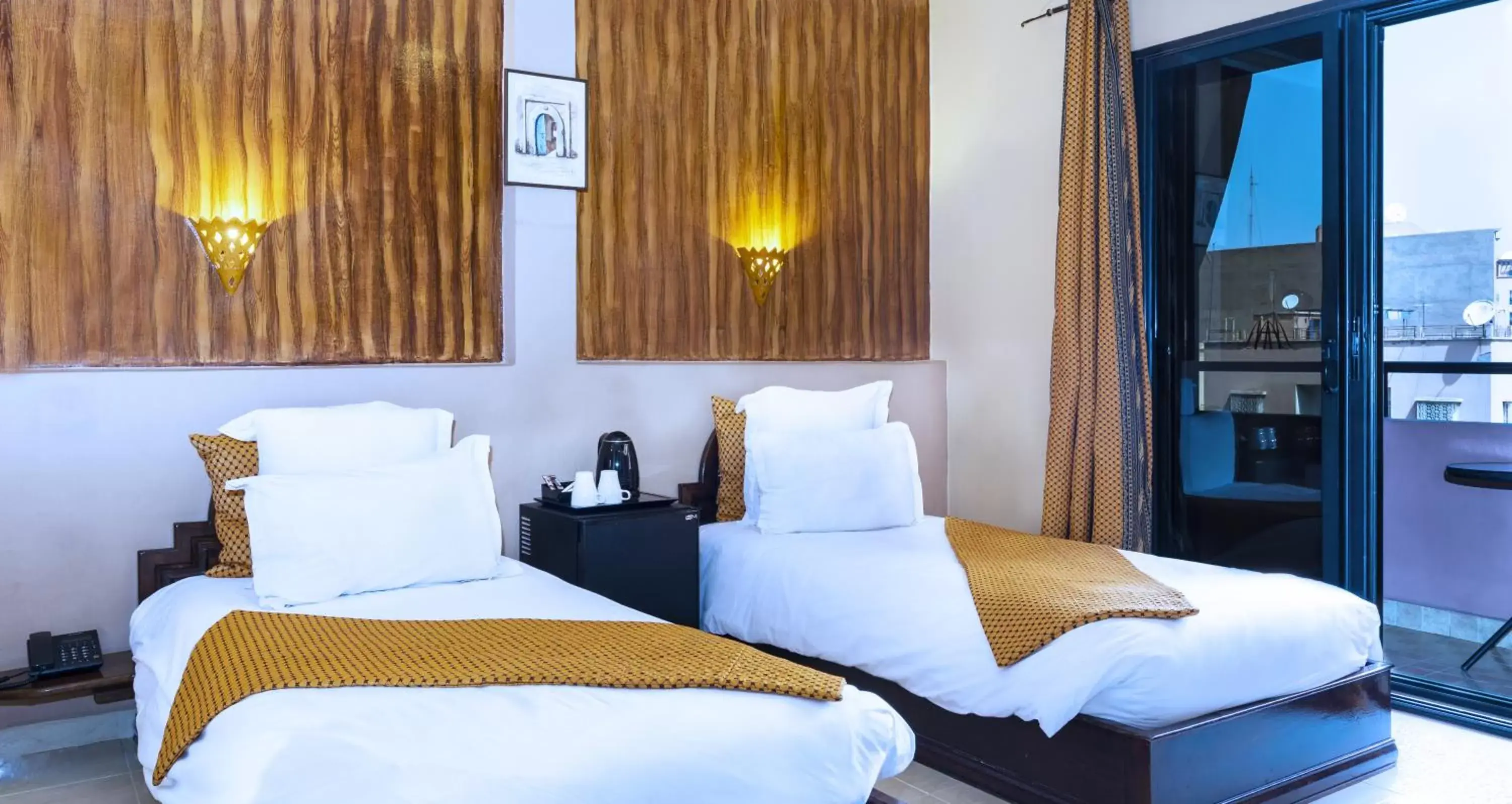 Bed in Amani Hotel Suites & Spa