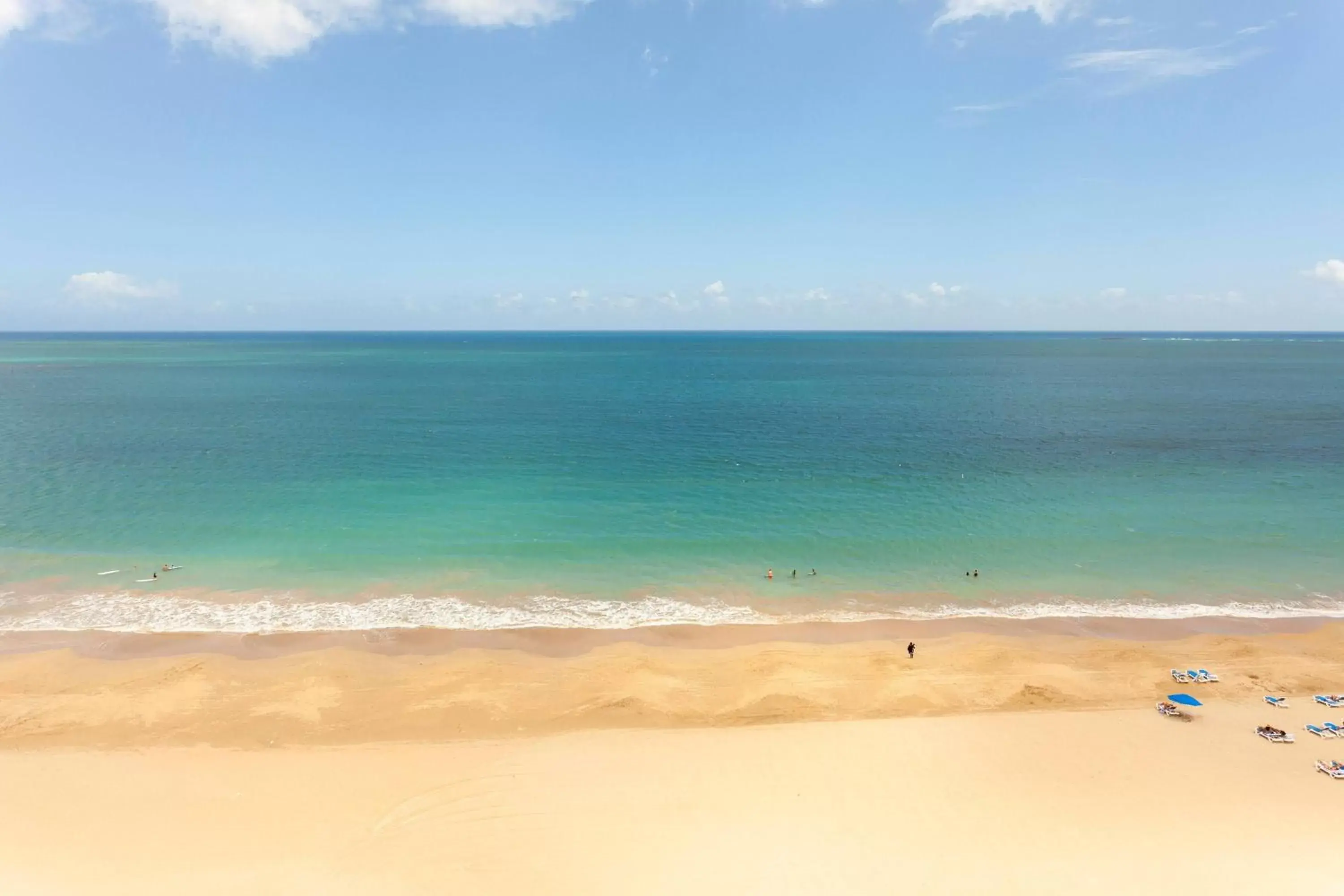 Photo of the whole room, Beach in Courtyard by Marriott Isla Verde Beach Resort