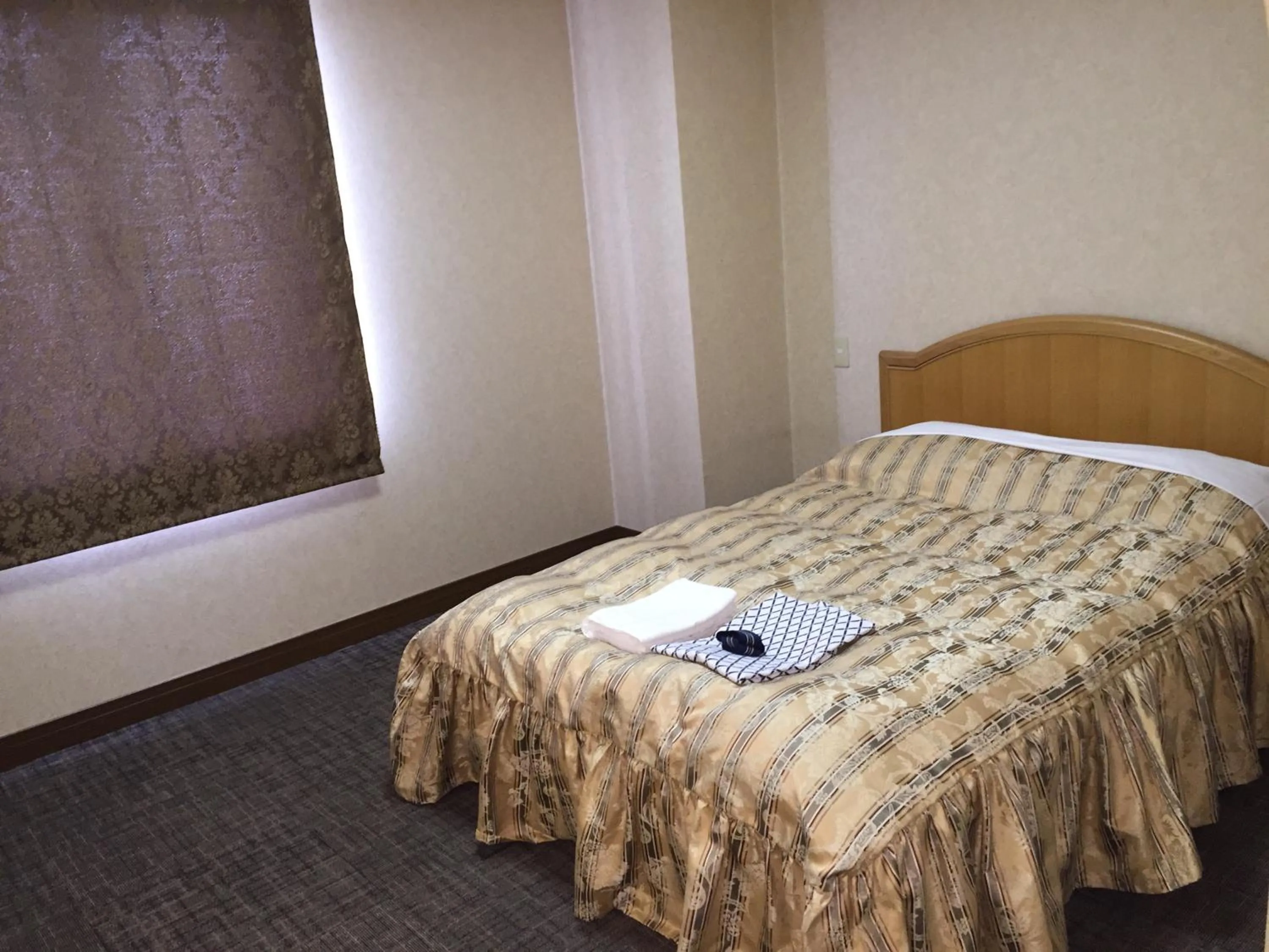 Bedroom, Bed in Nasushiobara Station Hotel