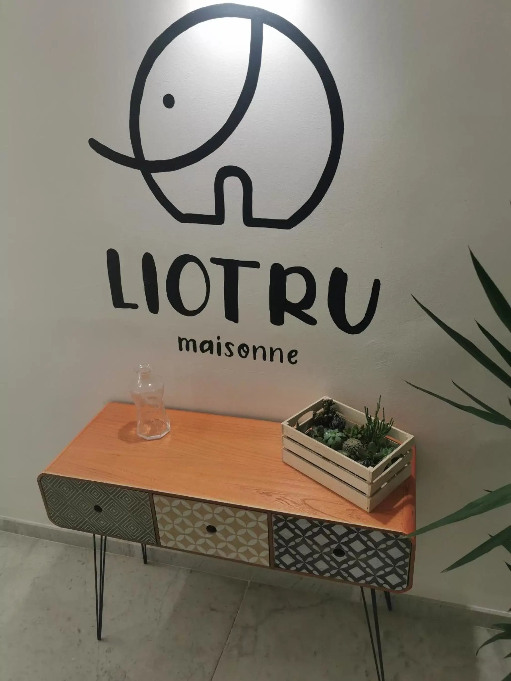 Property logo or sign in Liotru Maisonne