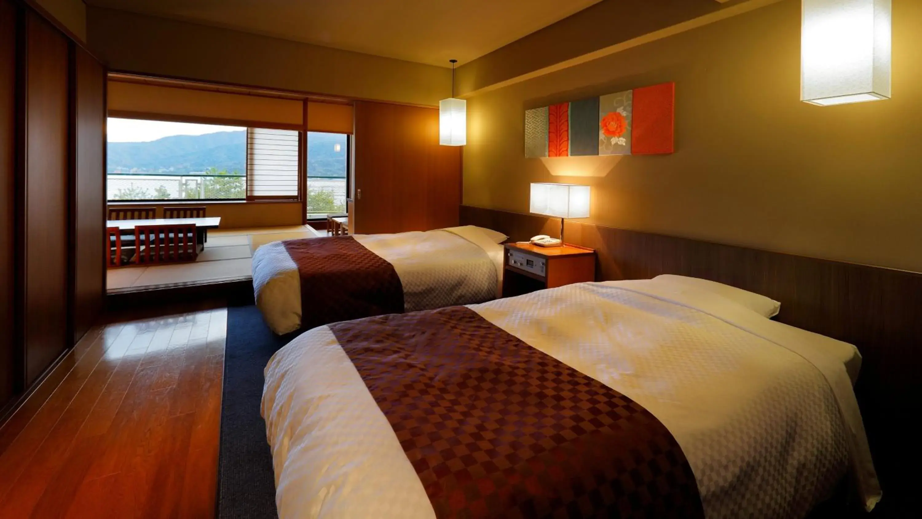 Bed in Aki Grand Hotel