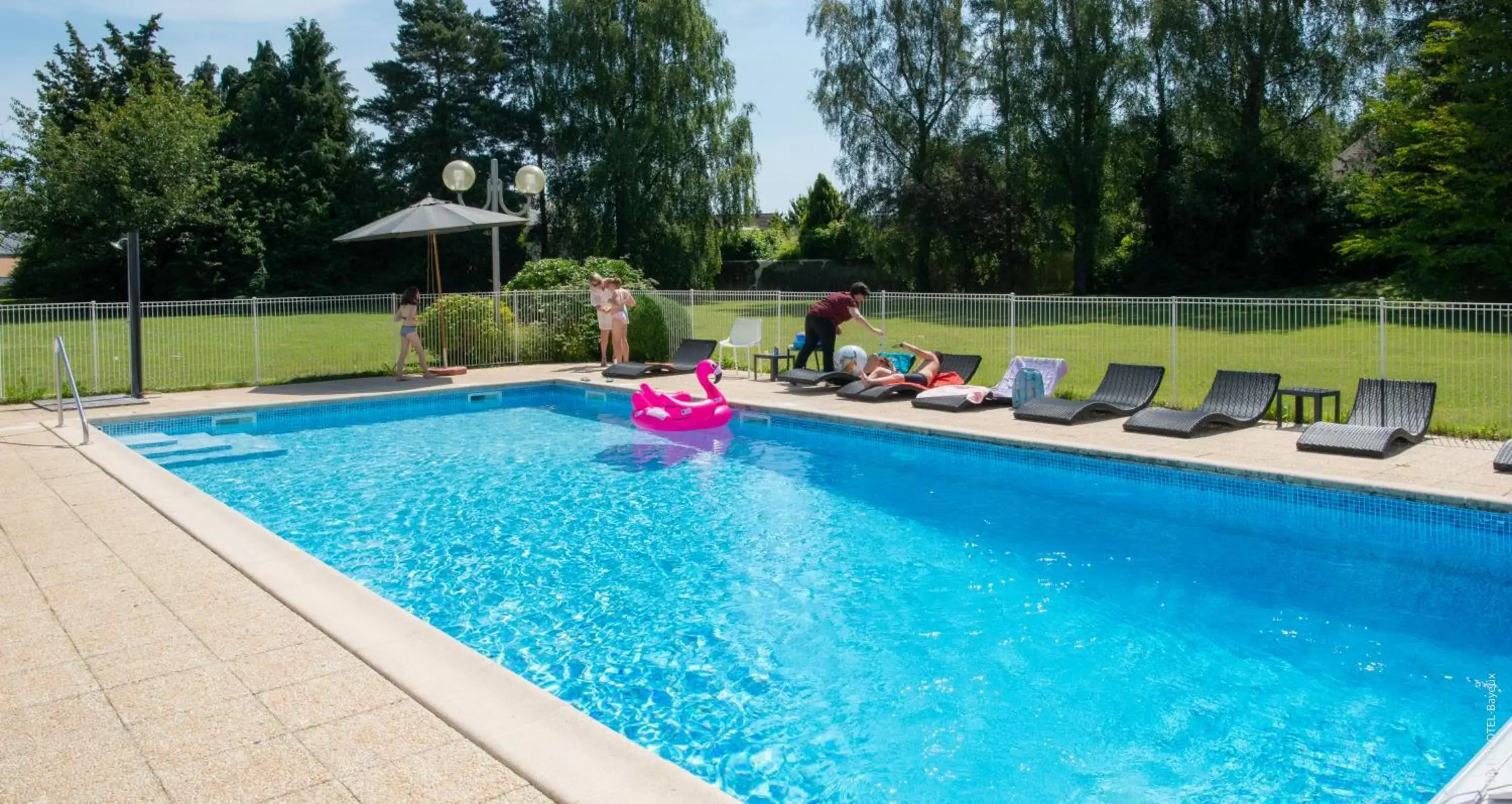 Garden, Swimming Pool in Novotel Bayeux