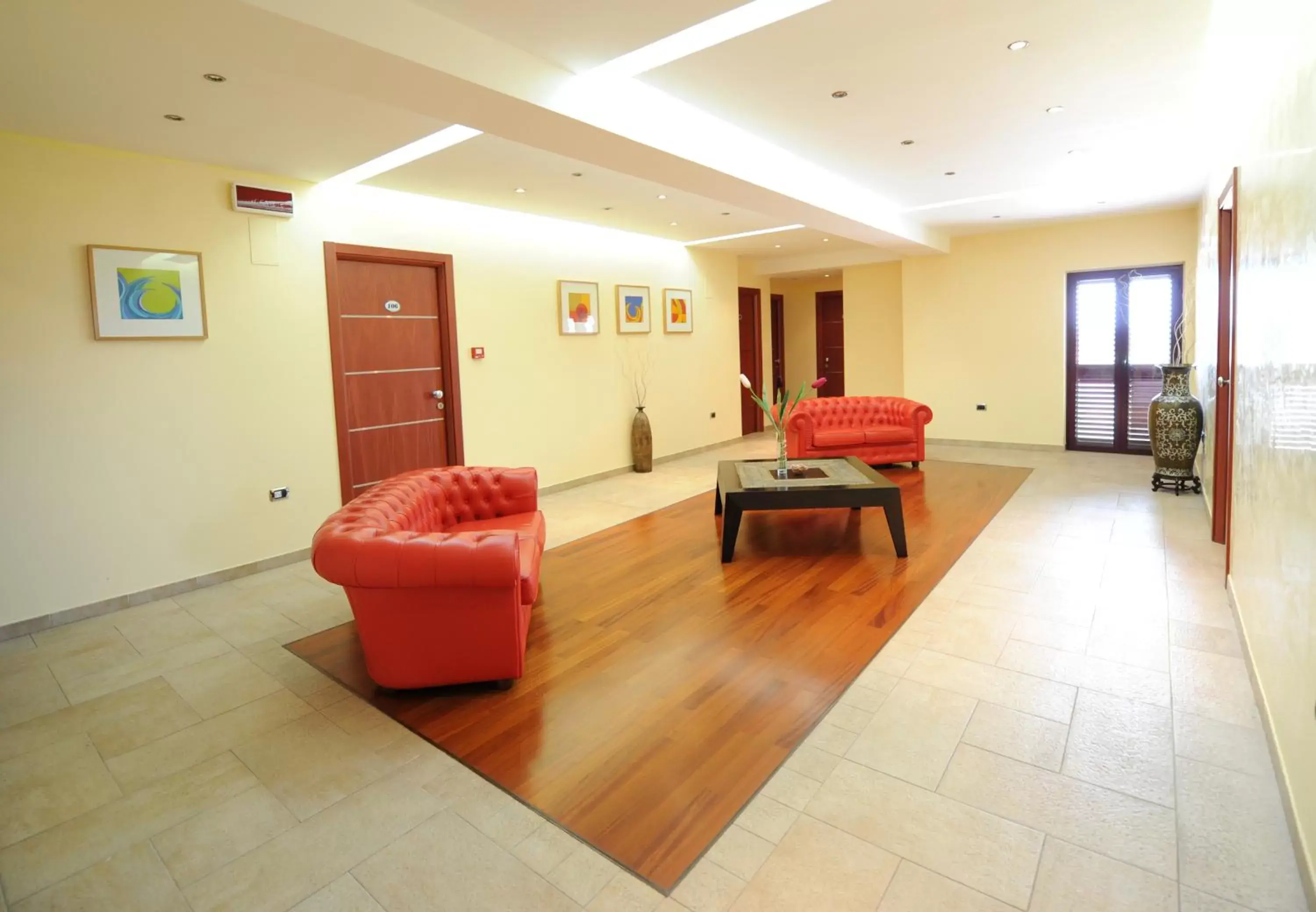 Communal lounge/ TV room in Santa Lucia Hotel