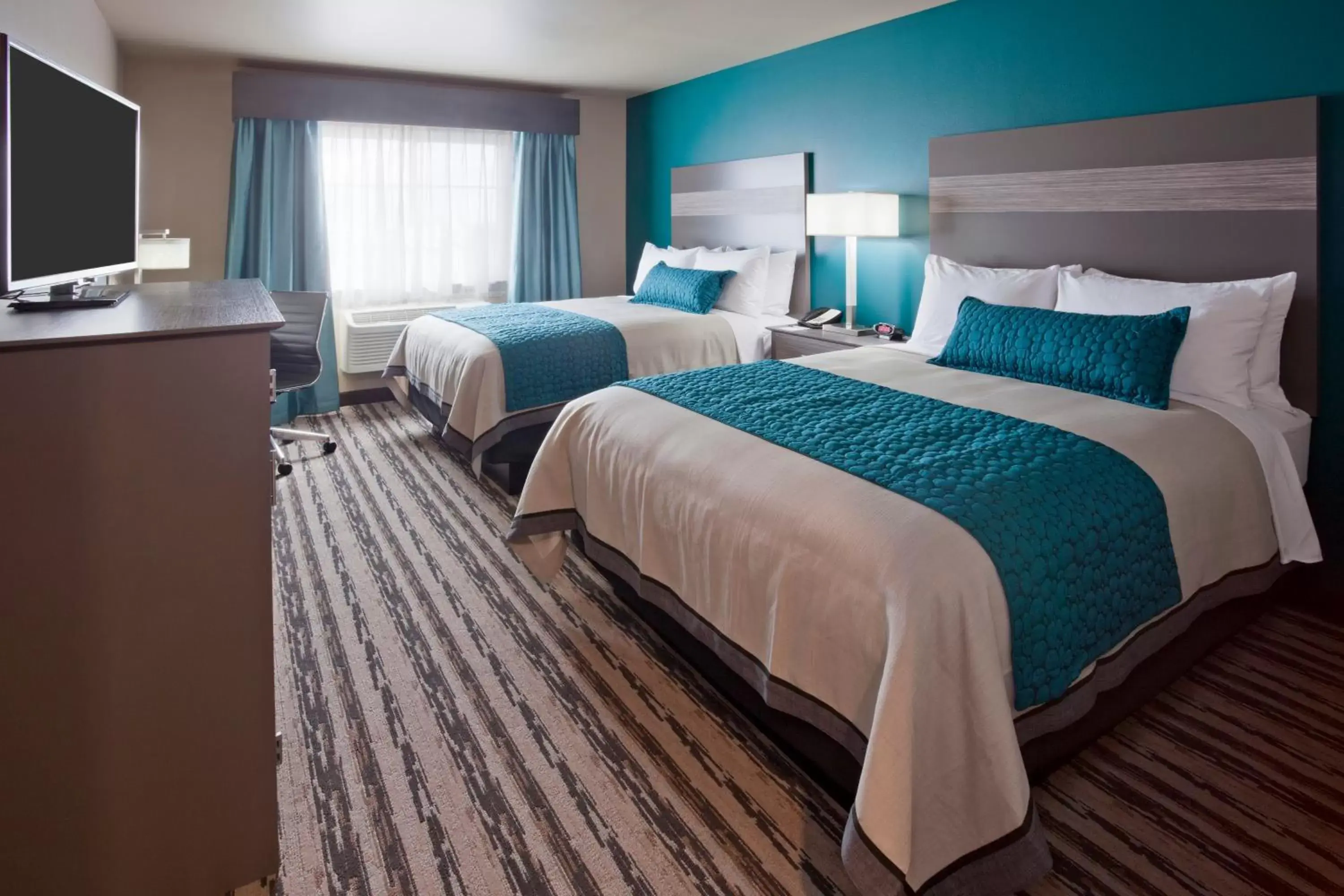 Photo of the whole room, Bed in GrandStay Hotel & Suites Valley City