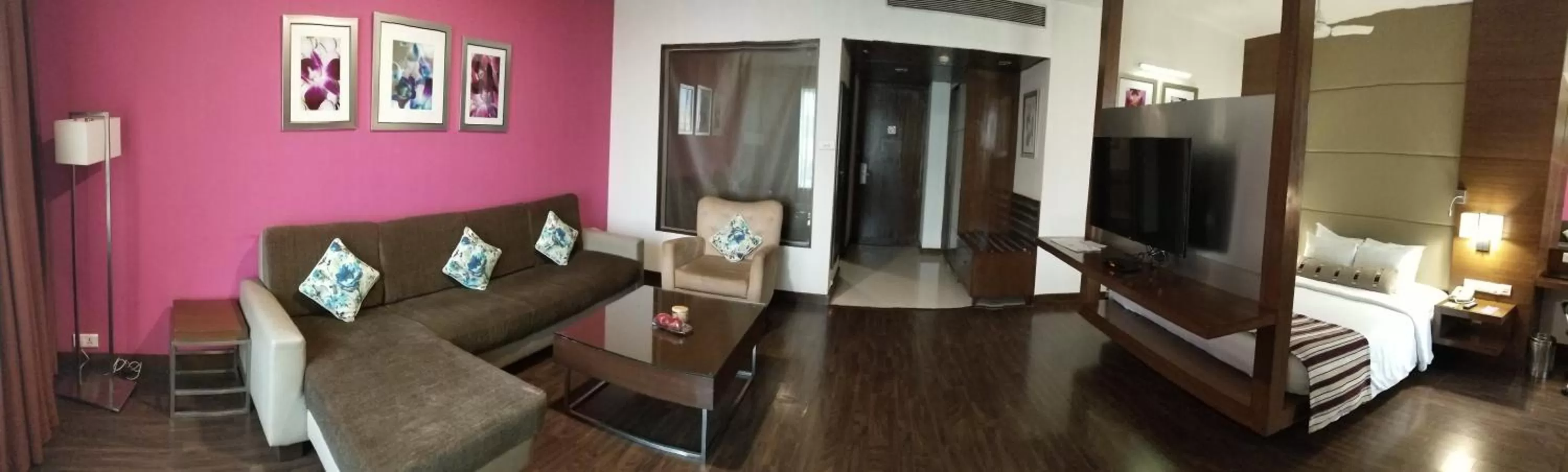 Communal lounge/ TV room in Royal Orchid Central, Pune