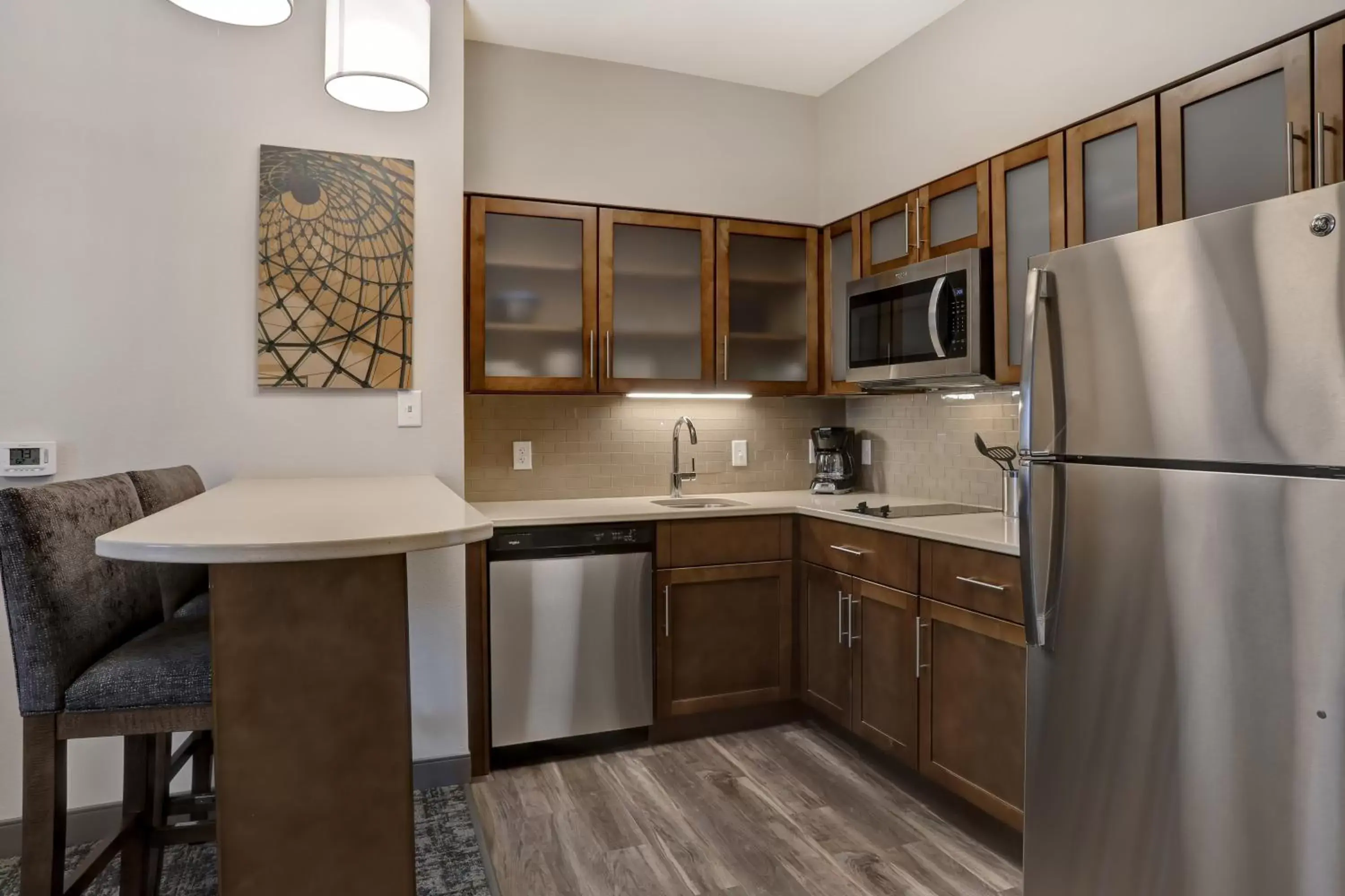 Photo of the whole room, Kitchen/Kitchenette in Staybridge Suites - Overland Park - Kansas City S, an IHG Hotel