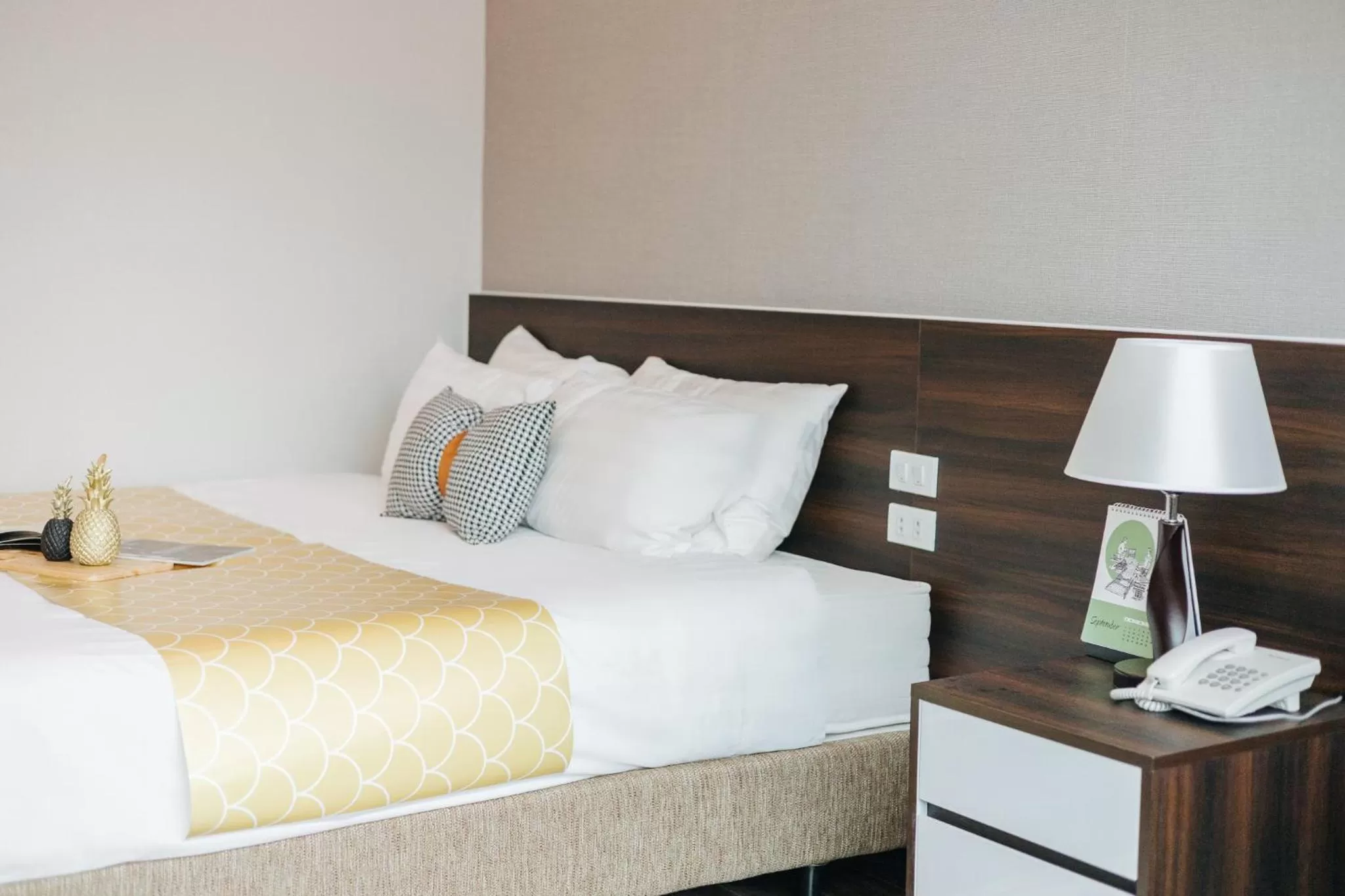 Bed in Ivy Hotel & Apartment