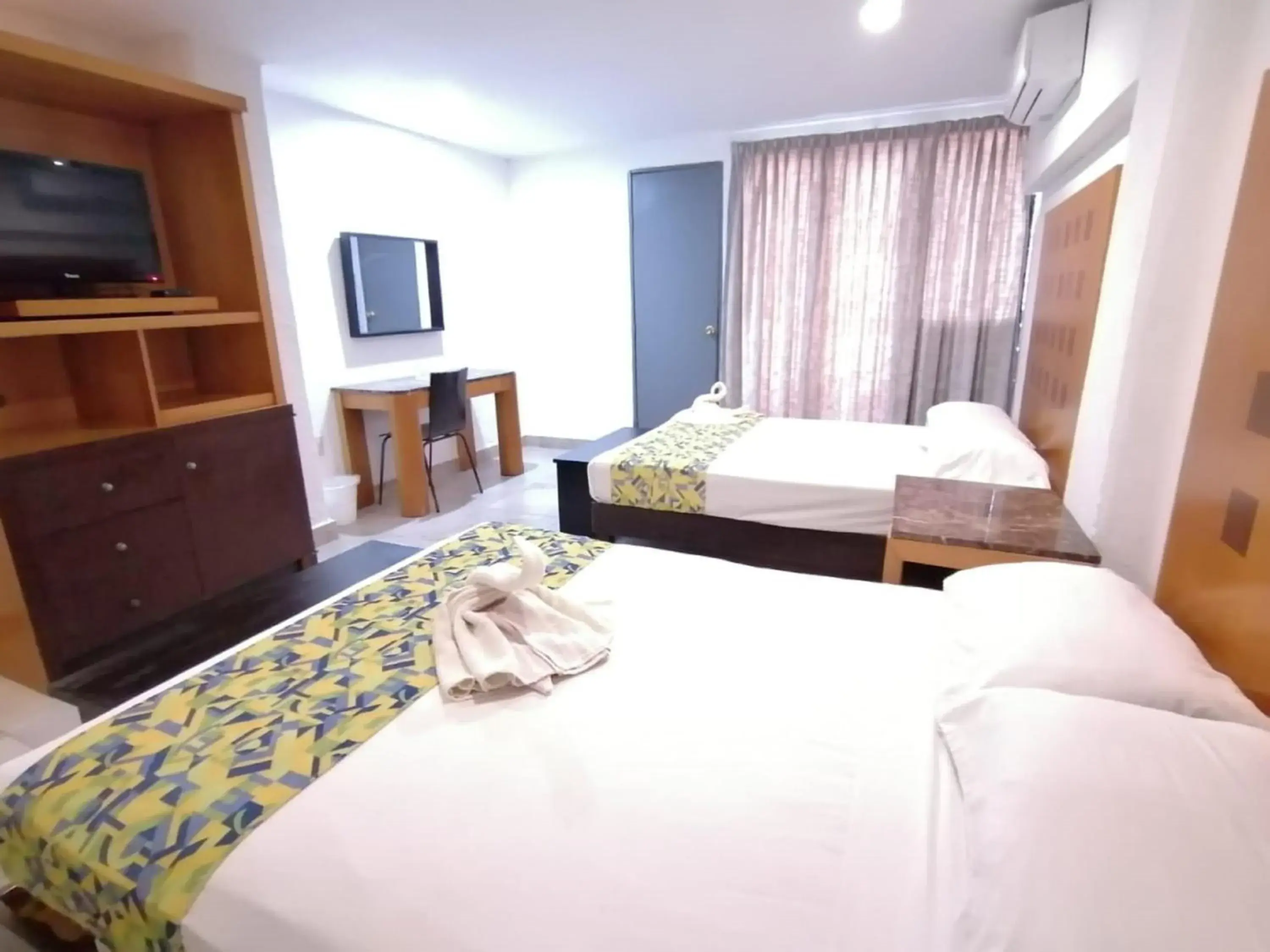 Bed in Hotel Ziami