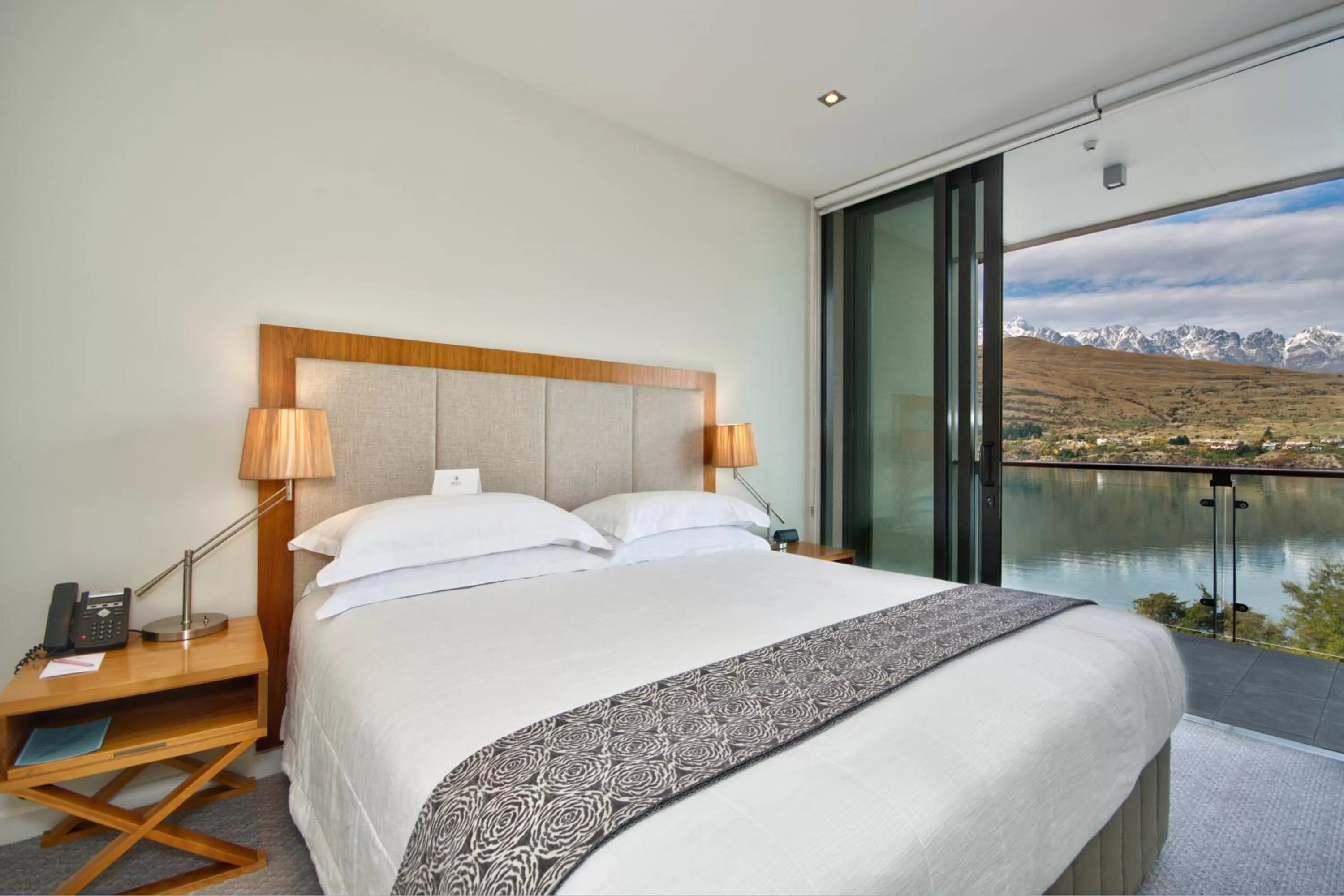 Bed in The Rees Hotel & Luxury Apartments