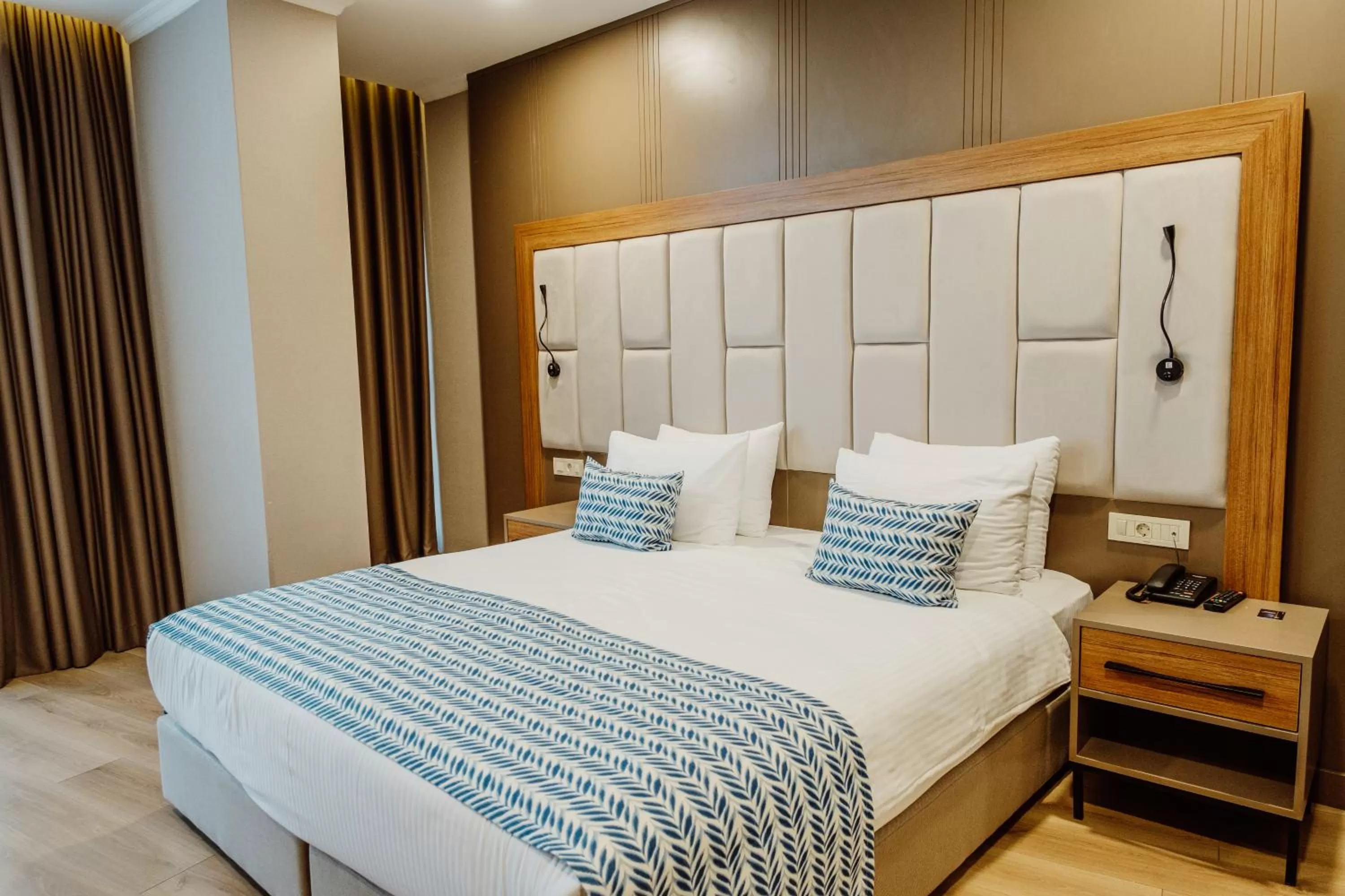 Bed in King Solomon Batumi Hotel