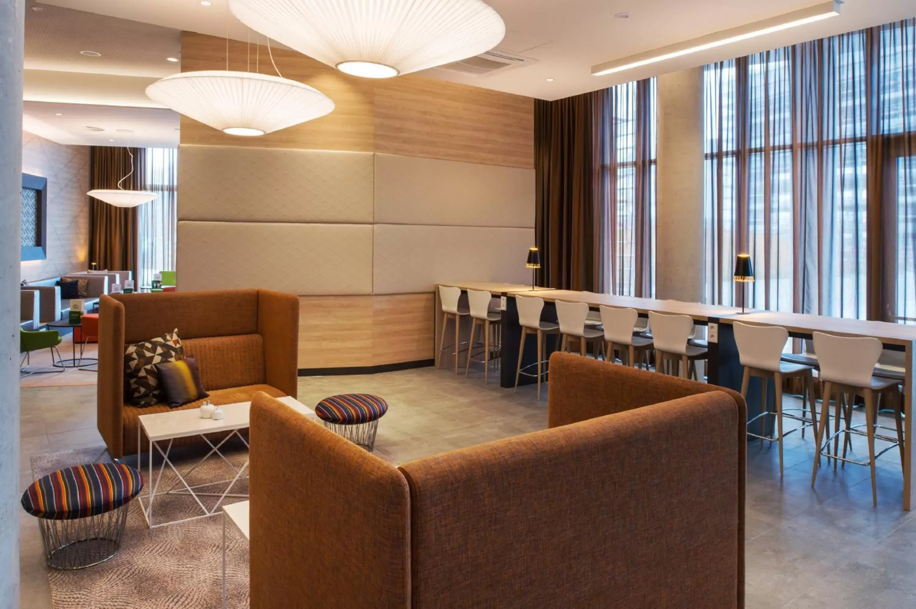 Lounge or bar in Holiday Inn Frankfurt Airport by IHG Lounge or bar in Holiday Inn Frankfurt Airport by IHG