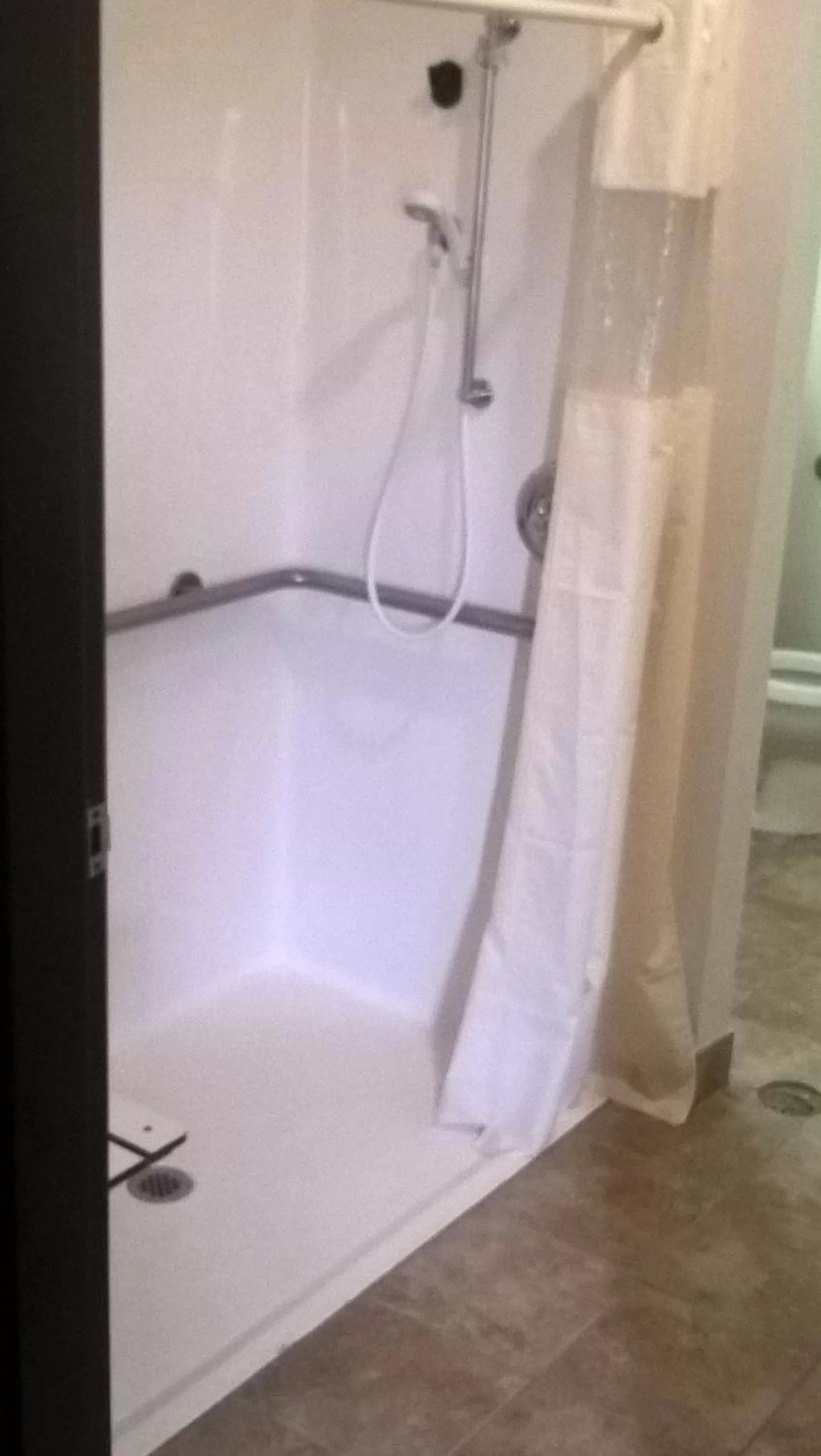 Bathroom in Days Inn & Suites by Wyndham Hutchinson